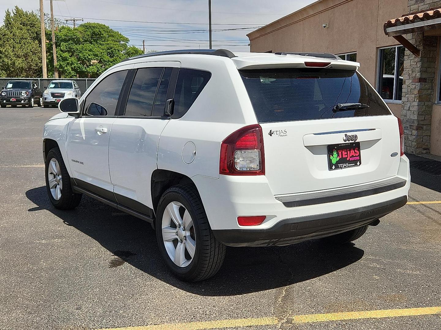 2014 WHITE /Light Pebble Beige/Dark Slate Gray - DK Jeep Compass Latitude (1C4NJCEB5ED) with an 2.4L I-4 DOHC, variable valve control, regular unleaded, engine with 172HP engine, located at 4110 Avenue Q, Lubbock, 79412, 33.556553, -101.855820 - Photo#2