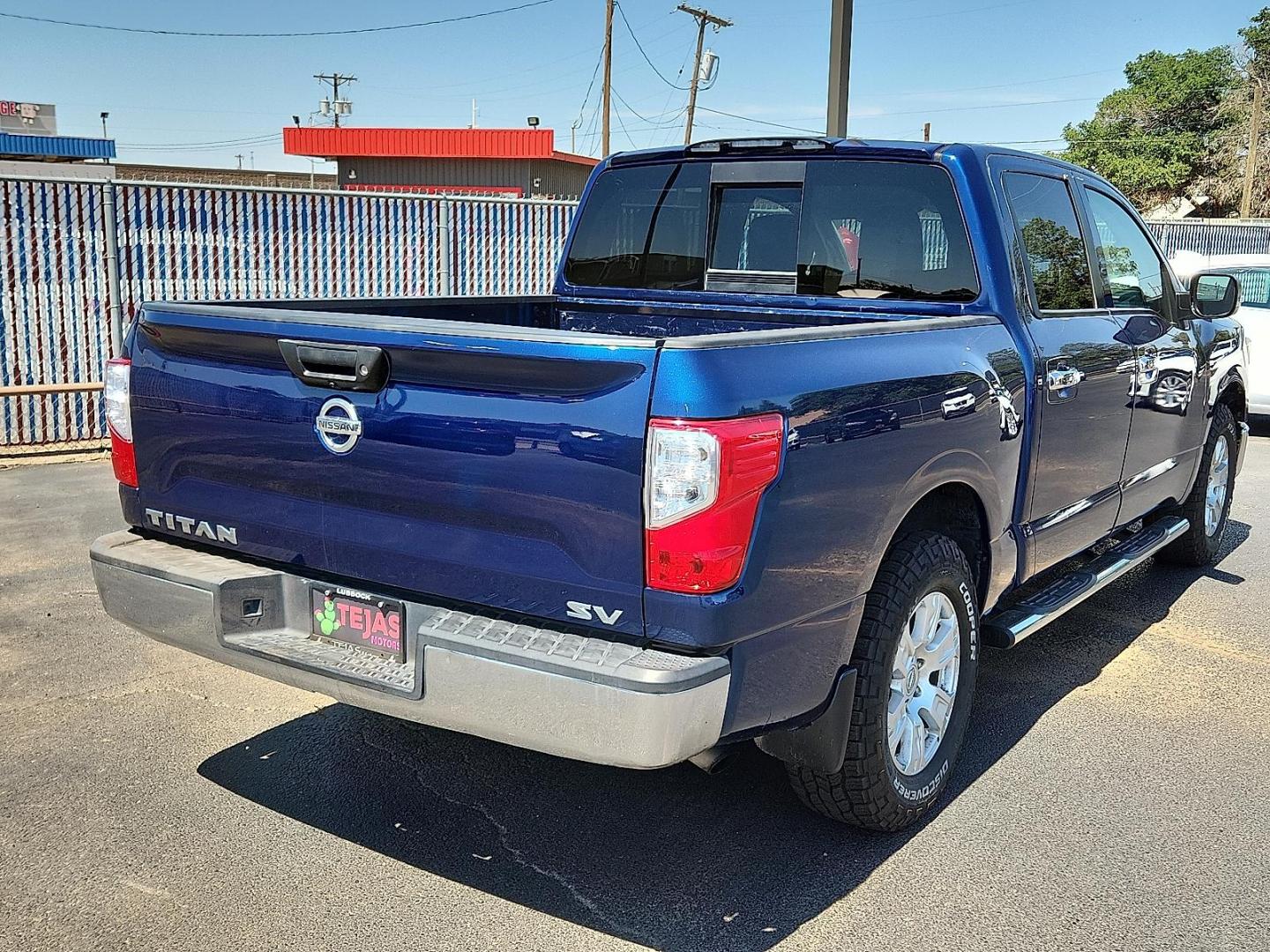 2019 Deep Blue Pearl Metallic - RAY Nissan TITAN SV (1N6AA1EK2KN) with an Endurance 5.6L V-8 gasoline direct injection, DOHC, variable valve control, regular unleaded, engine with 390HP engine, located at 4110 Avenue Q, Lubbock, 79412, 33.556553, -101.855820 - 05/13/2025 KEY IN ENVELOPE GOD - Photo#2