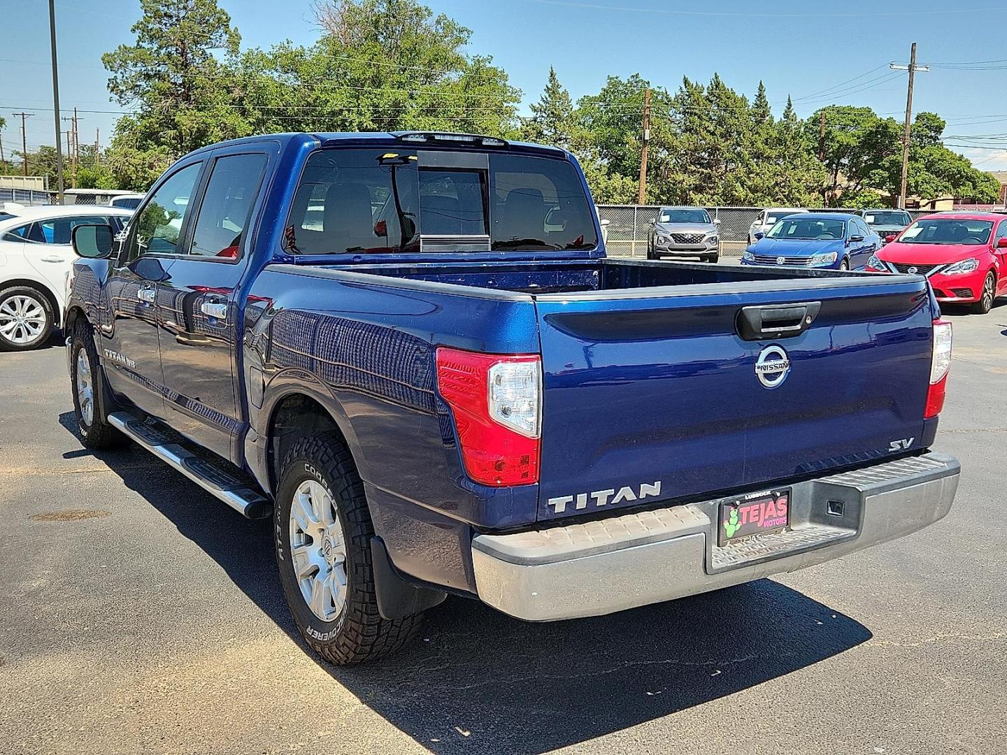 2019 Deep Blue Pearl Metallic - RAY Nissan TITAN SV (1N6AA1EK2KN) with an Endurance 5.6L V-8 gasoline direct injection, DOHC, variable valve control, regular unleaded, engine with 390HP engine, located at 4110 Avenue Q, Lubbock, 79412, 33.556553, -101.855820 - 05/13/2025 KEY IN ENVELOPE GOD - Photo#3