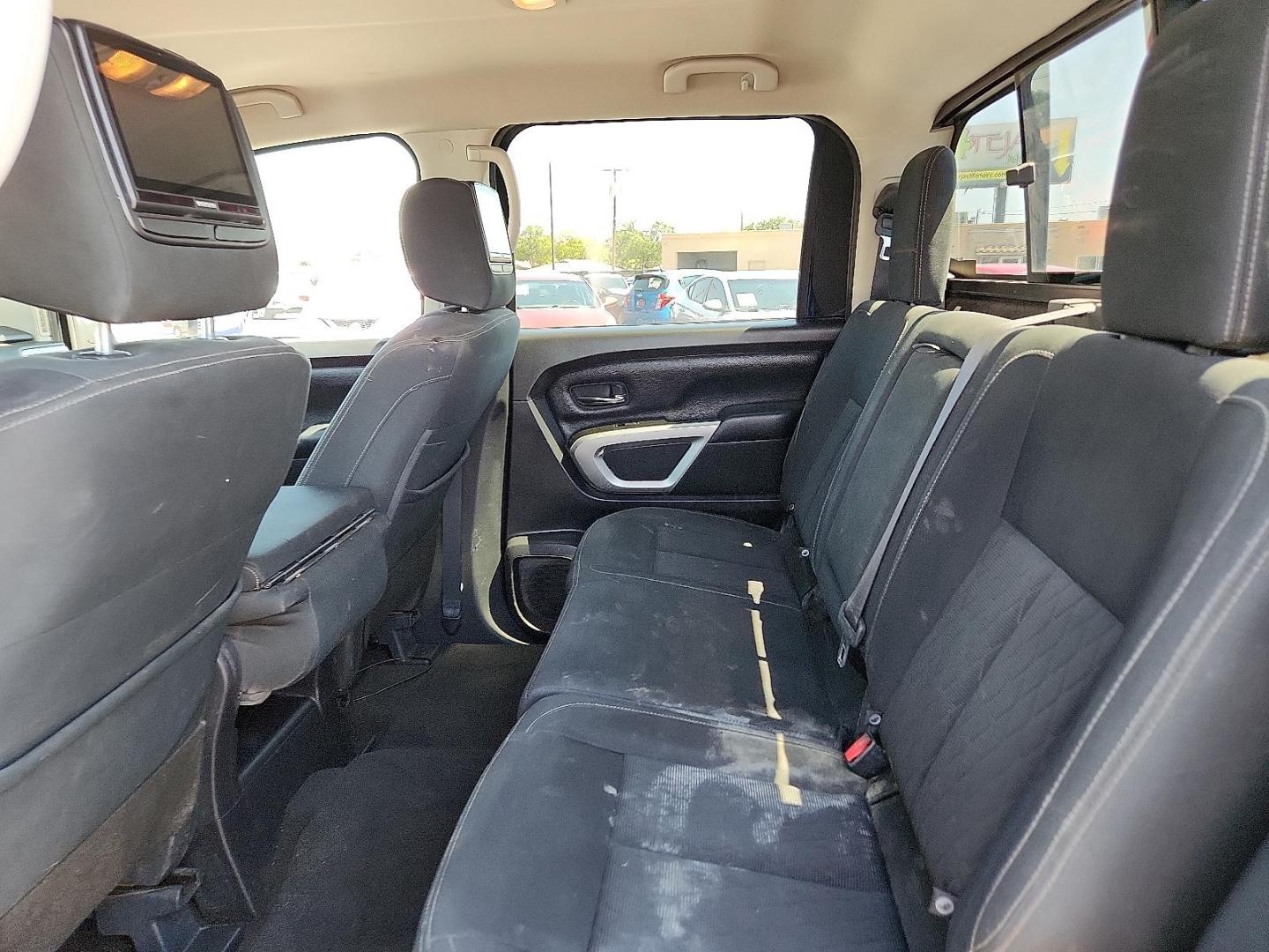 2019 Deep Blue Pearl Metallic - RAY Nissan TITAN SV (1N6AA1EK2KN) with an Endurance 5.6L V-8 gasoline direct injection, DOHC, variable valve control, regular unleaded, engine with 390HP engine, located at 4110 Avenue Q, Lubbock, 79412, 33.556553, -101.855820 - 05/13/2025 KEY IN ENVELOPE GOD - Photo#4