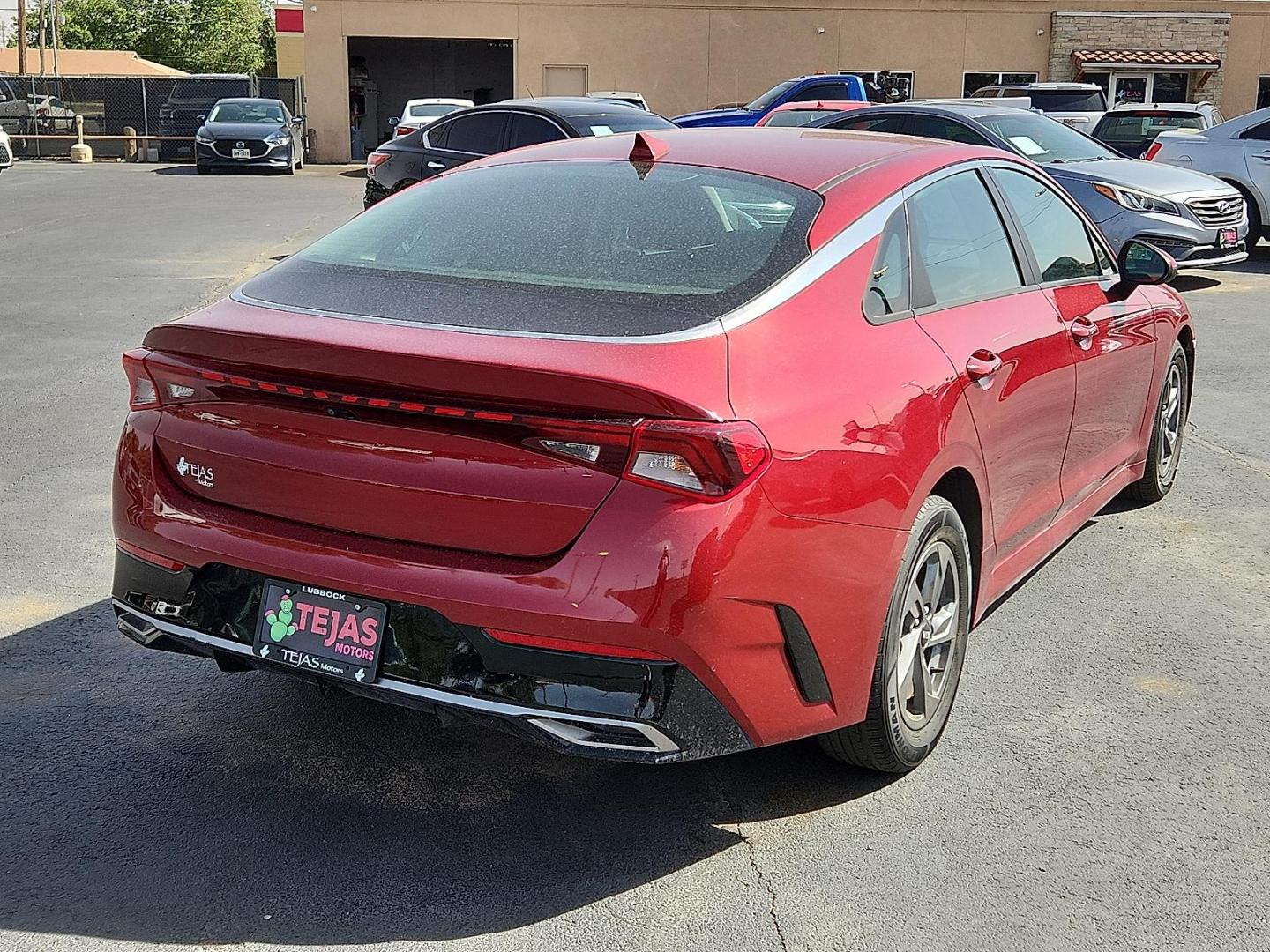 2021 Passion Red Kia K5 LXS (5XXG14J26MG) with an Gamma-II 1.6L I-4 gasoline direct injection, DOHC, CVVD variable valve control, intercooled turbo, regular unleaded, engine with 180HP engine, located at 4110 Avenue Q, Lubbock, 79412, 33.556553, -101.855820 - Photo#1