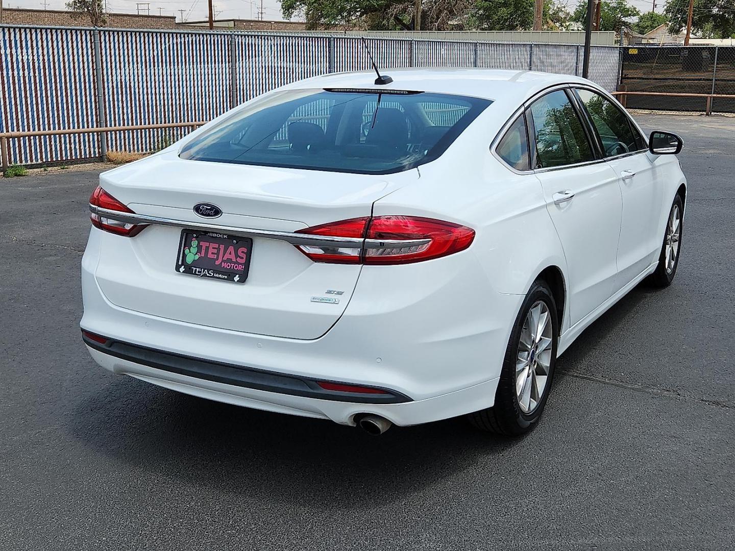 2017 WHITE Ford Fusion SE (3FA6P0HD7HR) with an EcoBoost 1.5L I-4 gasoline direct injection, DOHC, Ti-VCT variable valve control, intercooled turbo, regular unleaded, engine with 181HP engine, located at 4110 Avenue Q, Lubbock, 79412, 33.556553, -101.855820 - 05/28/2025 KEY IN ENVELOPE GOD - Photo#1