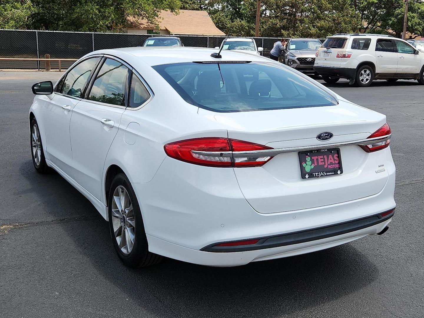 2017 WHITE Ford Fusion SE (3FA6P0HD7HR) with an EcoBoost 1.5L I-4 gasoline direct injection, DOHC, Ti-VCT variable valve control, intercooled turbo, regular unleaded, engine with 181HP engine, located at 4110 Avenue Q, Lubbock, 79412, 33.556553, -101.855820 - 05/28/2025 KEY IN ENVELOPE GOD - Photo#2