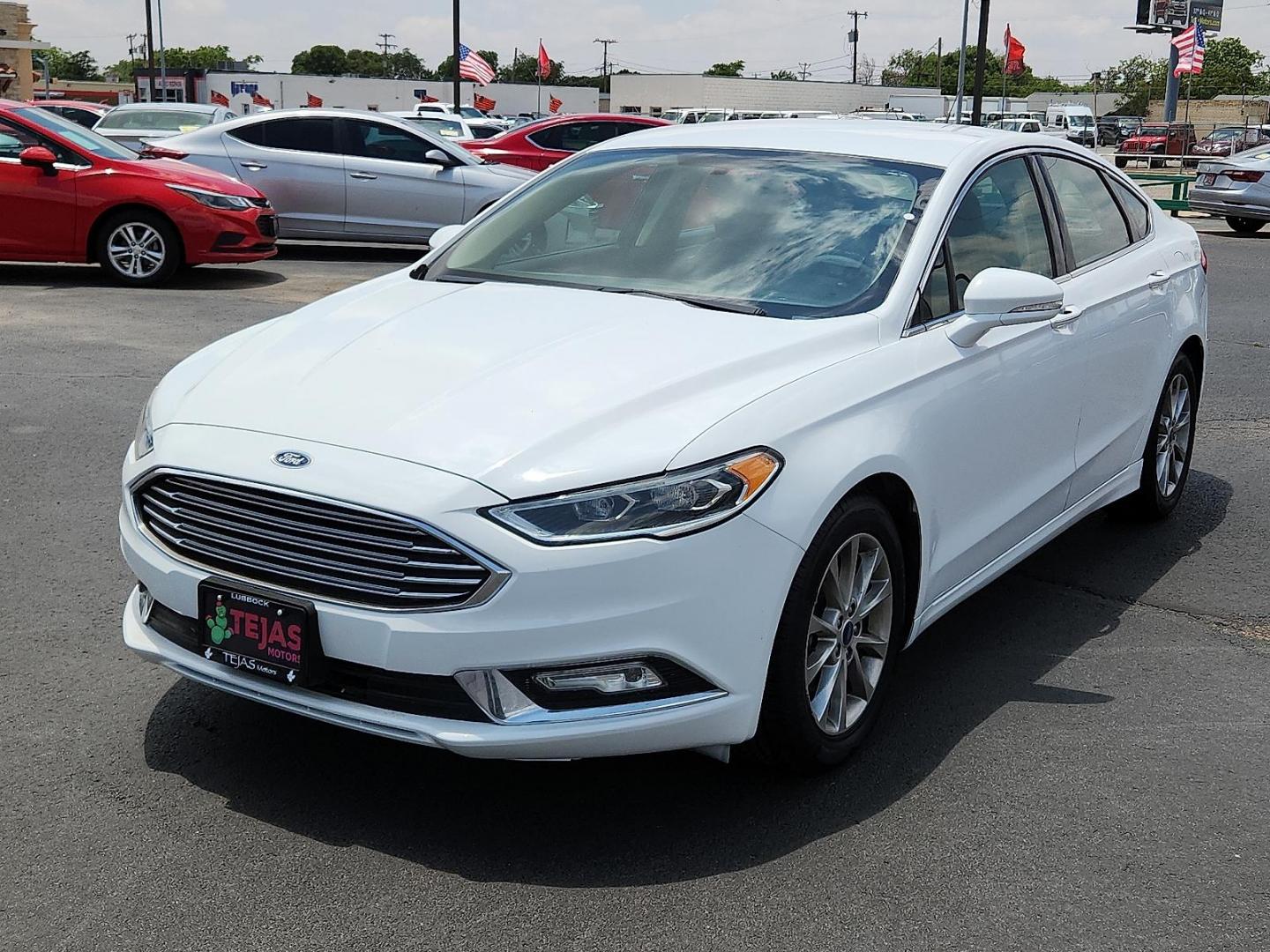 2017 WHITE Ford Fusion SE (3FA6P0HD7HR) with an EcoBoost 1.5L I-4 gasoline direct injection, DOHC, Ti-VCT variable valve control, intercooled turbo, regular unleaded, engine with 181HP engine, located at 4110 Avenue Q, Lubbock, 79412, 33.556553, -101.855820 - 05/28/2025 KEY IN ENVELOPE GOD - Photo#3