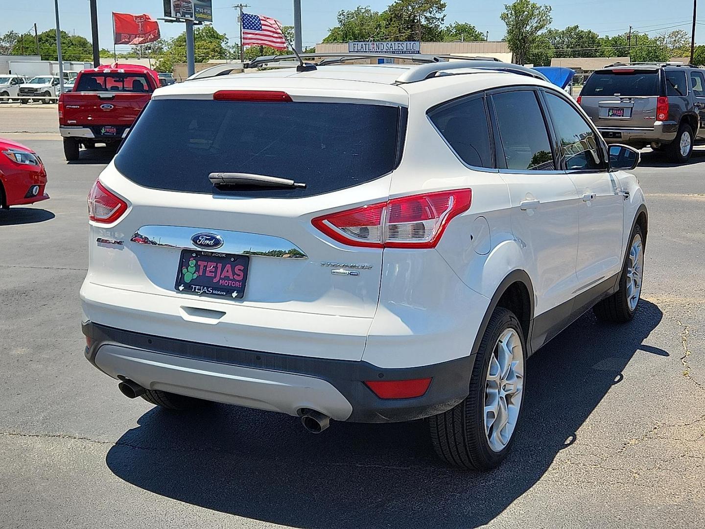 2016 WHITE Ford Escape Titanium (1FMCU9J98GU) with an EcoBoost 2L I-4 gasoline direct injection, DOHC, variable valve control, intercooled turbo, regular unleaded, engine with 240HP engine, located at 4110 Avenue Q, Lubbock, 79412, 33.556553, -101.855820 - 06/05/2025 KEY IN ENVELOPE GOD - Photo#1