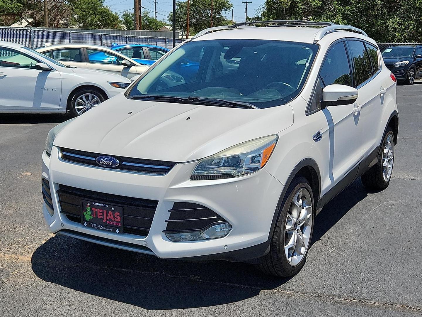 2016 WHITE Ford Escape Titanium (1FMCU9J98GU) with an EcoBoost 2L I-4 gasoline direct injection, DOHC, variable valve control, intercooled turbo, regular unleaded, engine with 240HP engine, located at 4110 Avenue Q, Lubbock, 79412, 33.556553, -101.855820 - 06/05/2025 KEY IN ENVELOPE GOD - Photo#3