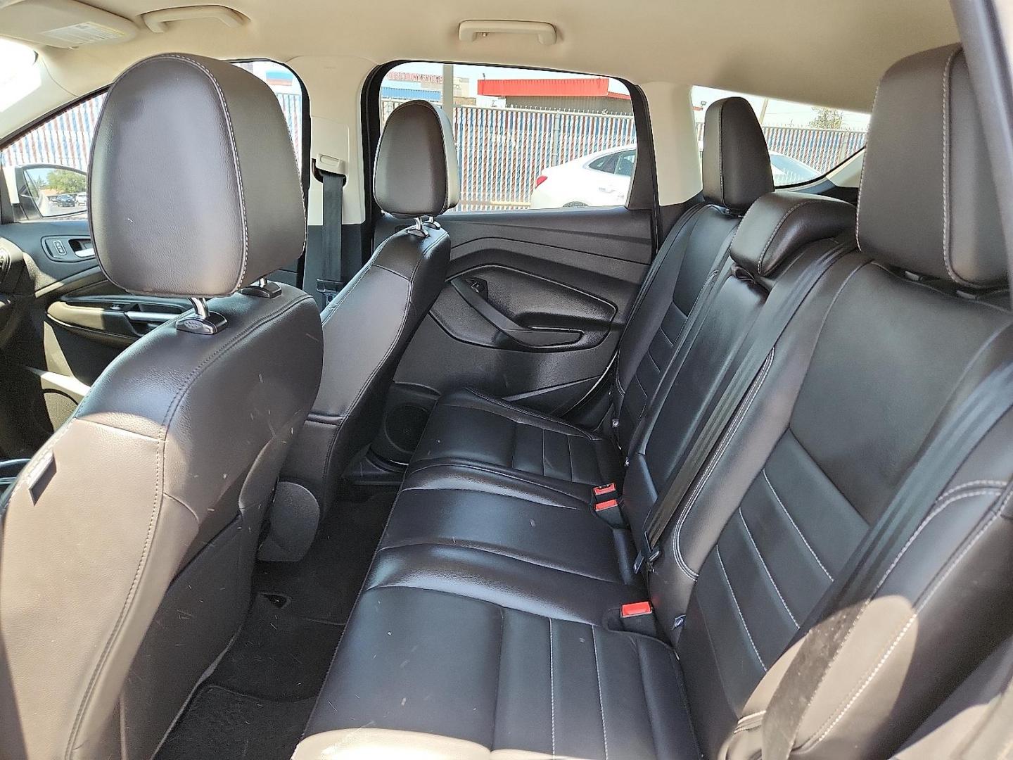 2016 WHITE Ford Escape Titanium (1FMCU9J98GU) with an EcoBoost 2L I-4 gasoline direct injection, DOHC, variable valve control, intercooled turbo, regular unleaded, engine with 240HP engine, located at 4110 Avenue Q, Lubbock, 79412, 33.556553, -101.855820 - 06/05/2025 KEY IN ENVELOPE GOD - Photo#4