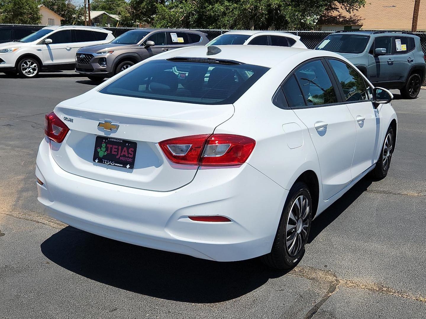 2018 WHITE Chevrolet Cruze LS Auto (1G1BC5SMXJ7) with an 1.4L I-4 gasoline direct injection, DOHC, variable valve control, intercooled turbo, regular unleaded, engine with 153HP engine, located at 4110 Avenue Q, Lubbock, 79412, 33.556553, -101.855820 - 06/07/2025 KEY IN ENVELOPE GOD - Photo#1