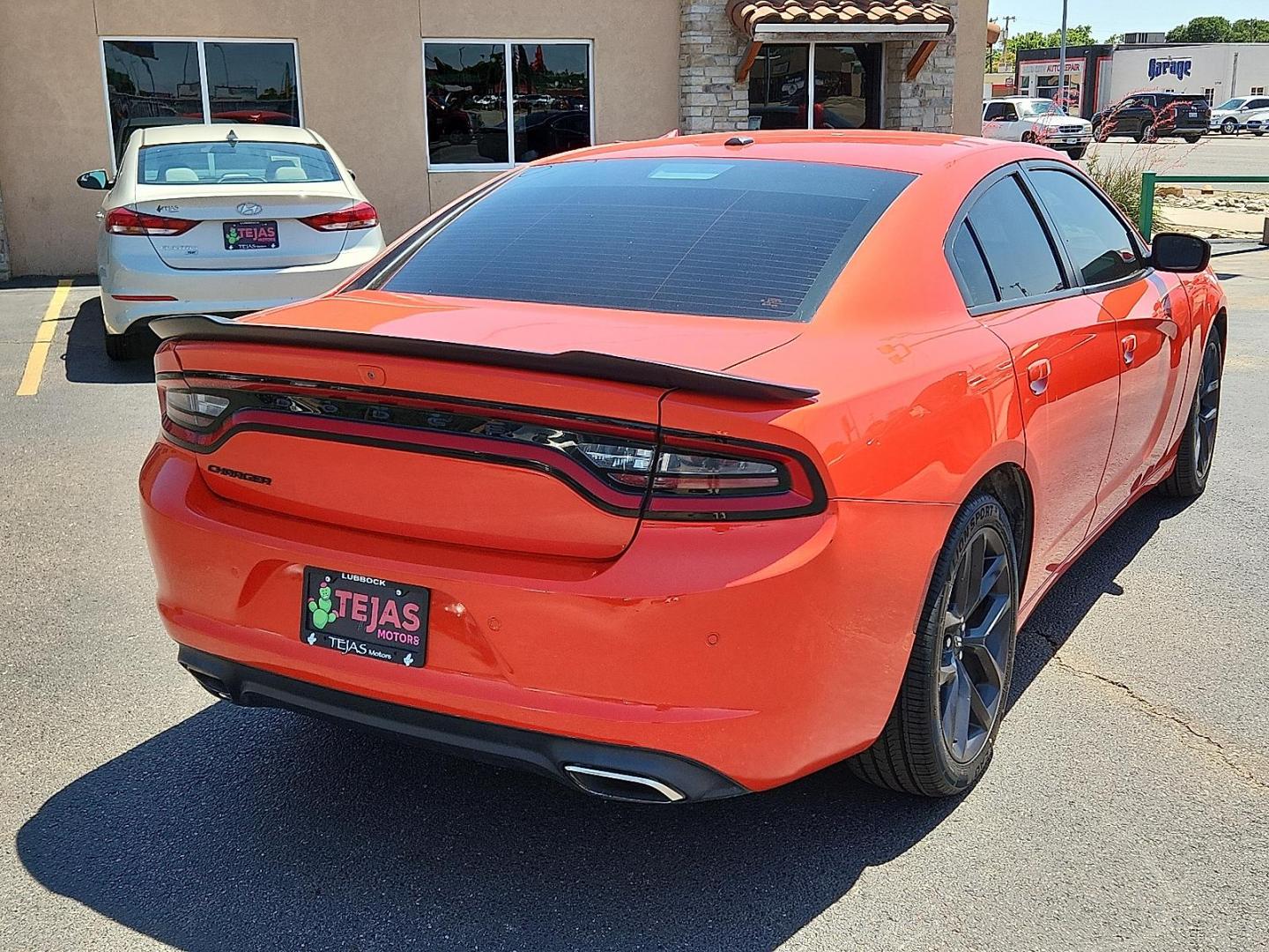 2020 ORANGE Dodge Charger SXT RWD (2C3CDXBG5LH) with an Pentastar 3.6L V-6 DOHC, variable valve control, regular unleaded, engine with 292HP engine, located at 4110 Avenue Q, Lubbock, 79412, 33.556553, -101.855820 - Photo#1