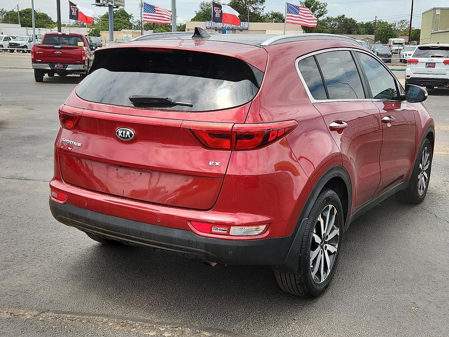 2017 RED Kia Sportage EX (KNDPN3AC4H7) with an Theta II 2.4L I-4 gasoline direct injection, DOHC, D-CVVT variable valve control, regular unleaded, engine with 181HP engine, located at 4110 Avenue Q, Lubbock, 79412, 33.556553, -101.855820 - 06/19/2025 KEY IN ENVELOPE GOD - Photo#1