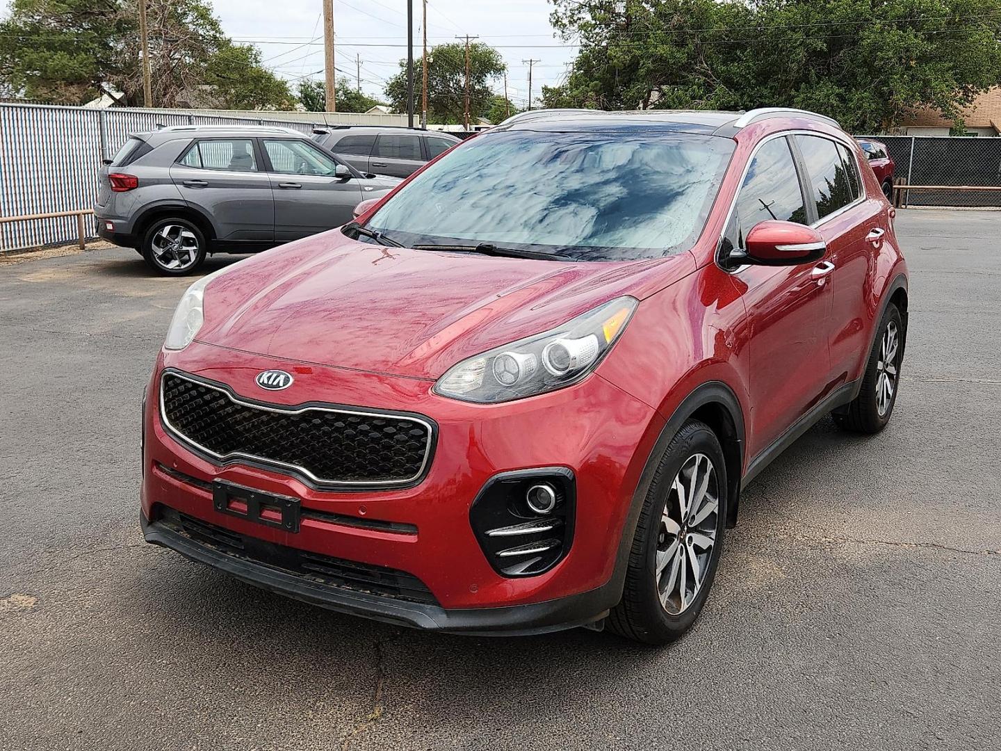 2017 RED Kia Sportage EX (KNDPN3AC4H7) with an Theta II 2.4L I-4 gasoline direct injection, DOHC, D-CVVT variable valve control, regular unleaded, engine with 181HP engine, located at 4110 Avenue Q, Lubbock, 79412, 33.556553, -101.855820 - 06/19/2025 KEY IN ENVELOPE GOD - Photo#3