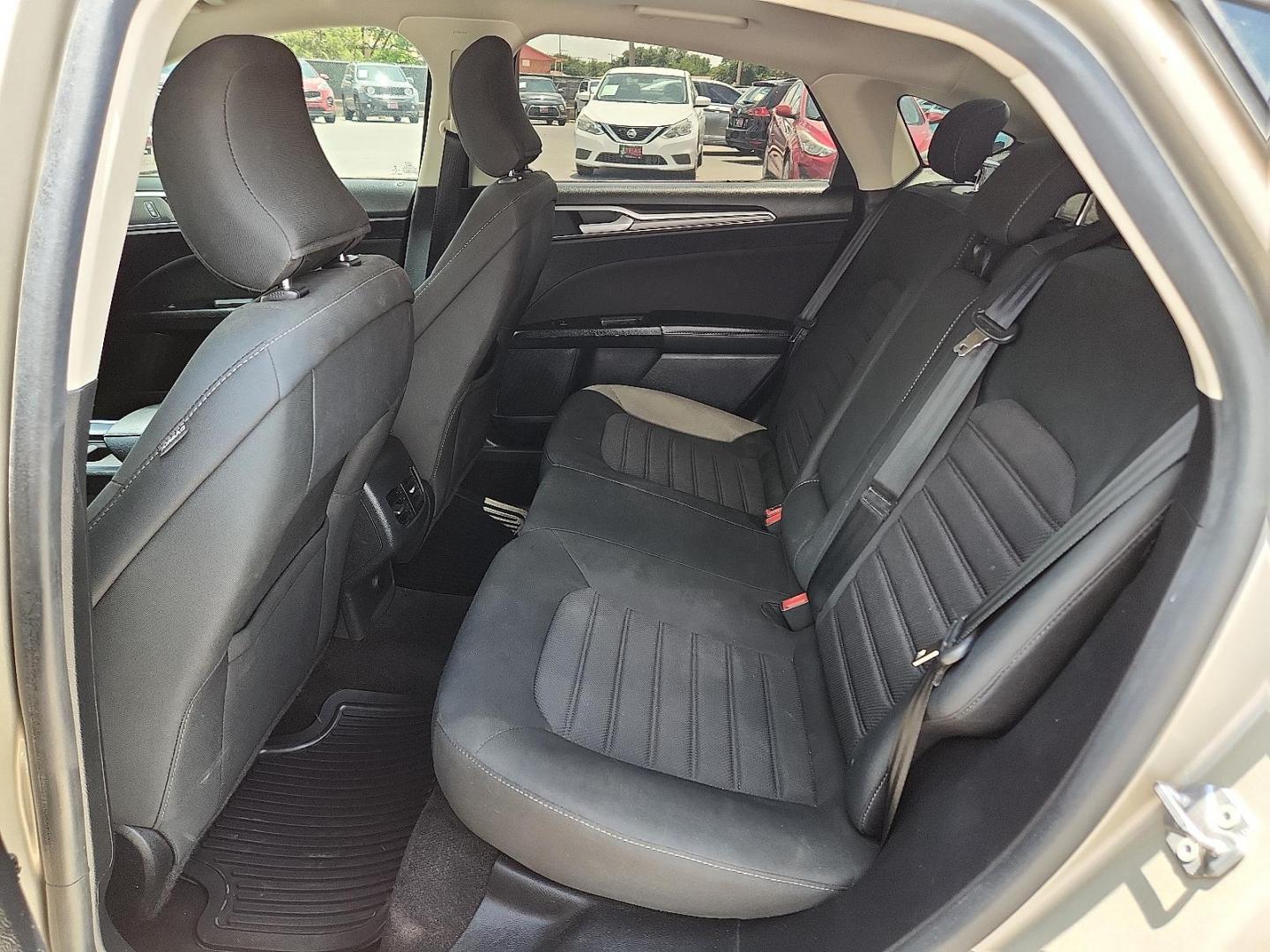 2019 GOLD Ford Fusion SE (3FA6P0T92KR) with an EcoBoost 2L I-4 gasoline direct injection, DOHC, variable valve control, intercooled turbo, premium unleaded, engine with 245HP engine, located at 4110 Avenue Q, Lubbock, 79412, 33.556553, -101.855820 - 06/14/2025 KEY IN ENVELOPE GOD - Photo#4