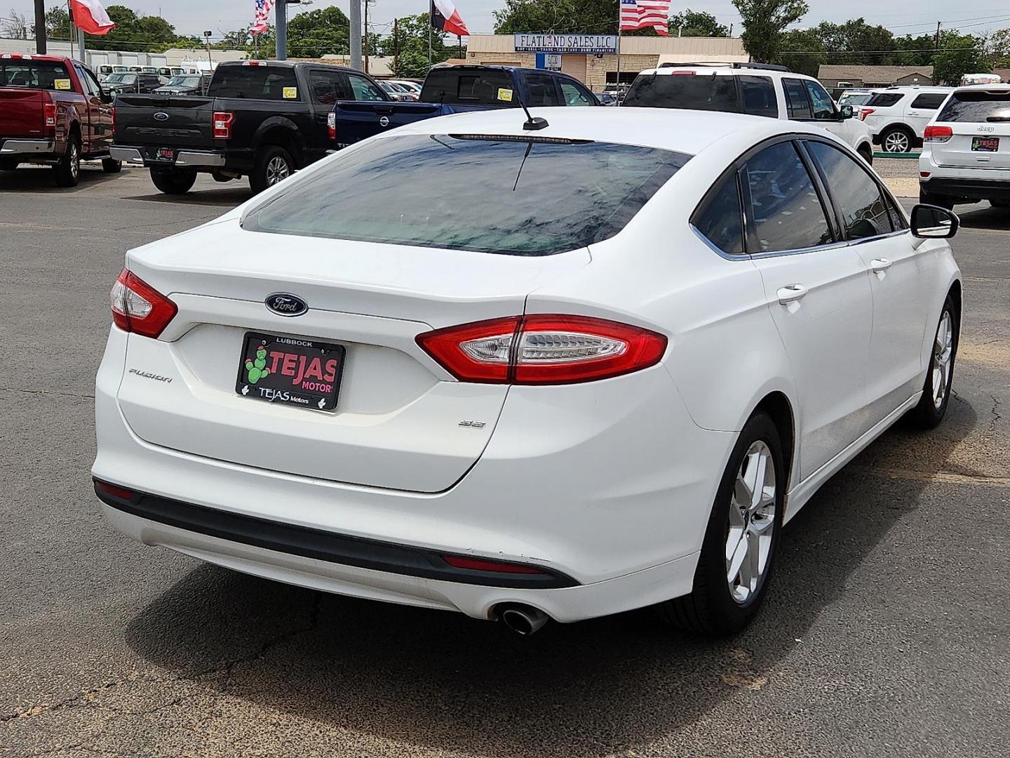 2014 WHITE Ford Fusion SE (3FA6P0H71ER) with an Duratec 2.5L I-4 DOHC, iVCT variable valve control, regular unleaded, engine with 175HP engine, located at 4110 Avenue Q, Lubbock, 79412, 33.556553, -101.855820 - 06/20/2025 KEY IN ENVELOPE GOD - Photo#1