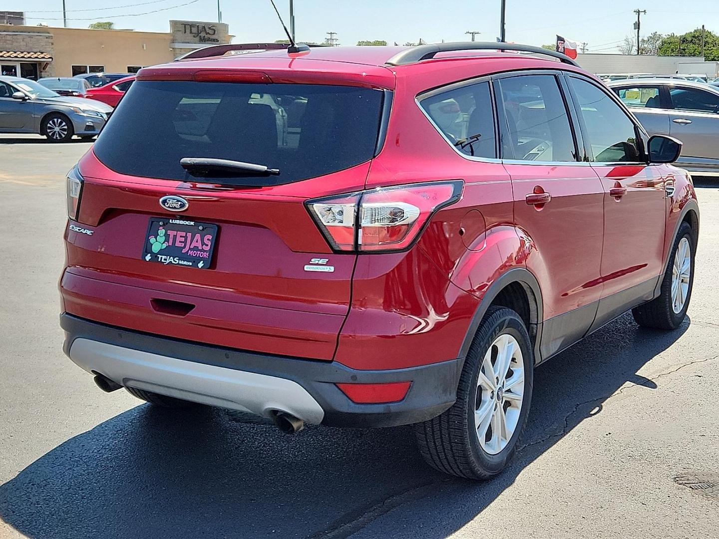 2017 RED Ford Escape SE (1FMCU0GD5HU) with an EcoBoost 1.5L I-4 gasoline direct injection, DOHC, variable valve control, intercooled turbo, regular unleaded, engine with 179HP engine, located at 4110 Avenue Q, Lubbock, 79412, 33.556553, -101.855820 - 07/05/2025 KEY IN ENVELOPE GOD - Photo#1