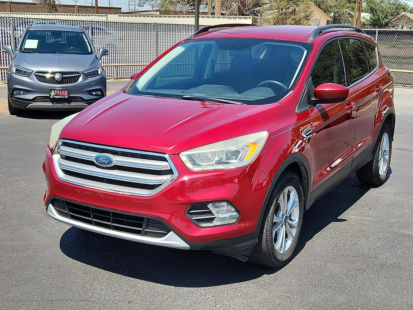 2017 RED Ford Escape SE (1FMCU0GD5HU) with an EcoBoost 1.5L I-4 gasoline direct injection, DOHC, variable valve control, intercooled turbo, regular unleaded, engine with 179HP engine, located at 4110 Avenue Q, Lubbock, 79412, 33.556553, -101.855820 - 07/05/2025 KEY IN ENVELOPE GOD - Photo#3