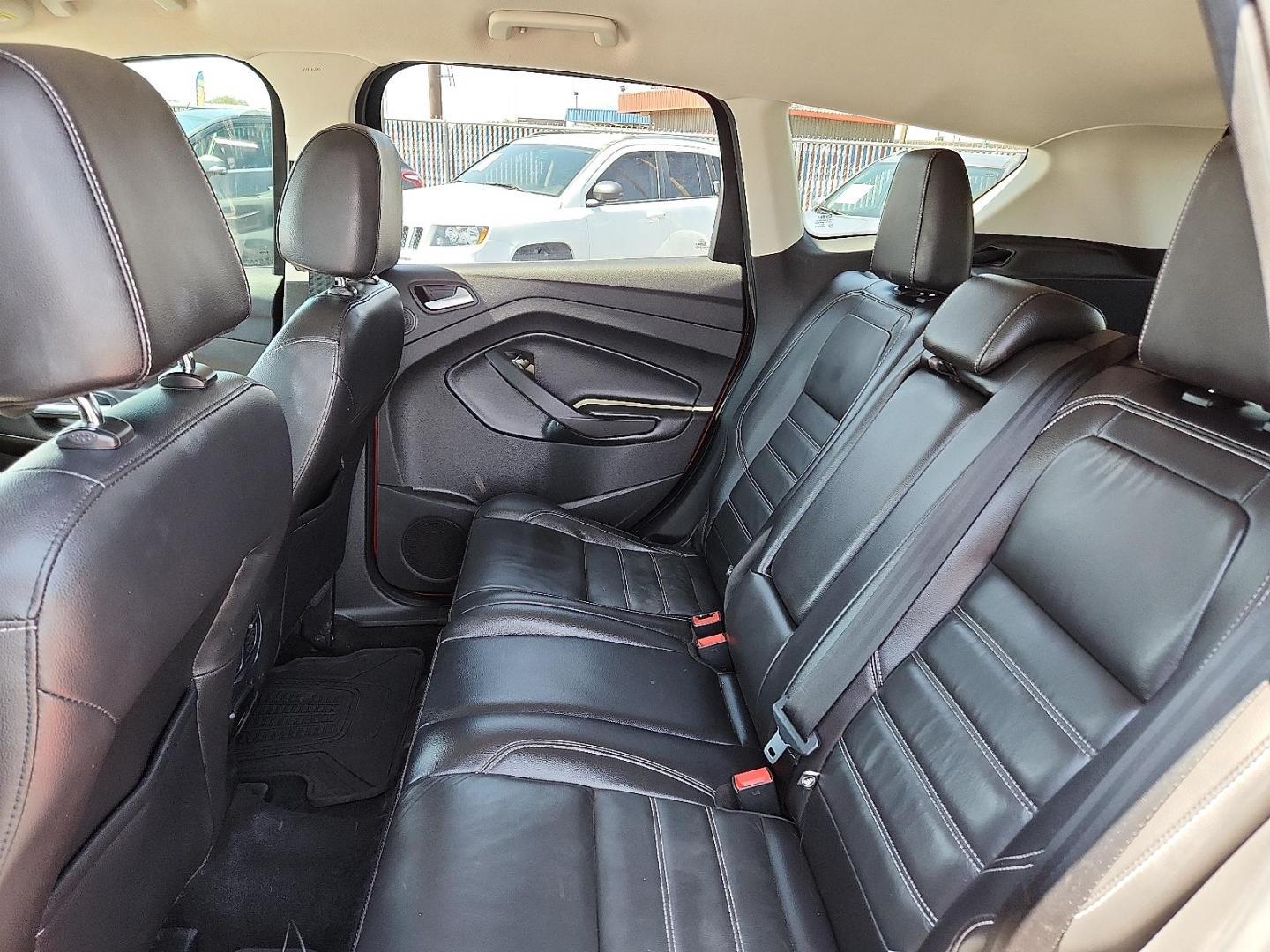 2017 RED Ford Escape SE (1FMCU0GD5HU) with an EcoBoost 1.5L I-4 gasoline direct injection, DOHC, variable valve control, intercooled turbo, regular unleaded, engine with 179HP engine, located at 4110 Avenue Q, Lubbock, 79412, 33.556553, -101.855820 - 07/05/2025 KEY IN ENVELOPE GOD - Photo#4