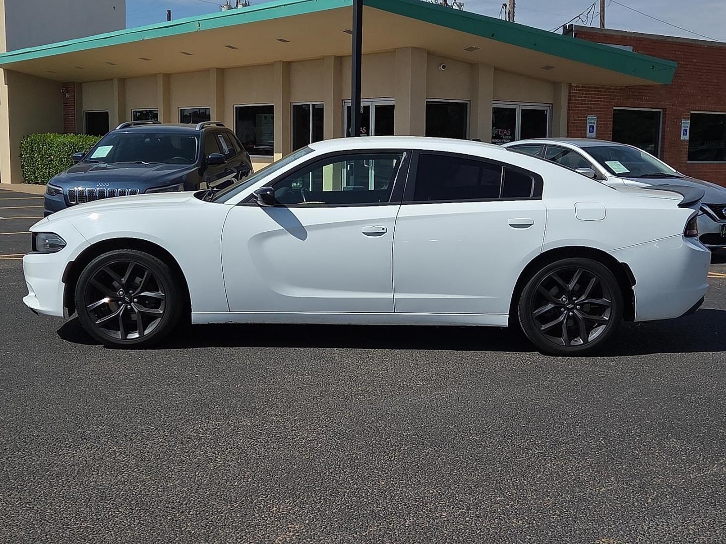2019 White Knuckle Clearcoat - PW7 /Black - X9 Dodge Charger SXT RWD (2C3CDXBG0KH) with an Pentastar 3.6L V-6 DOHC, variable valve control, regular unleaded, engine with 292HP engine, located at 4110 Avenue Q, Lubbock, 79412, 33.556553, -101.855820 - 07/23/2025 KEY IN ENVELOPE GOD - Photo#3