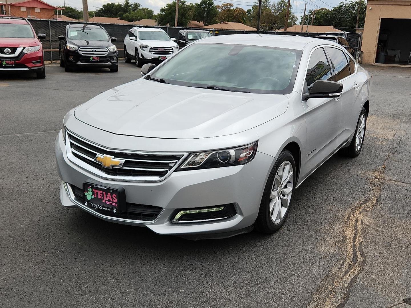 2018 SILVER Chevrolet Impala 1LT (2G1105S36J9) with an 3.6L DOHC V6 DI Engine engine, located at 4110 Avenue Q, Lubbock, 79412, 33.556553, -101.855820 - 07/31/2025 KEY IN RNVELOPE GOD - Photo#3
