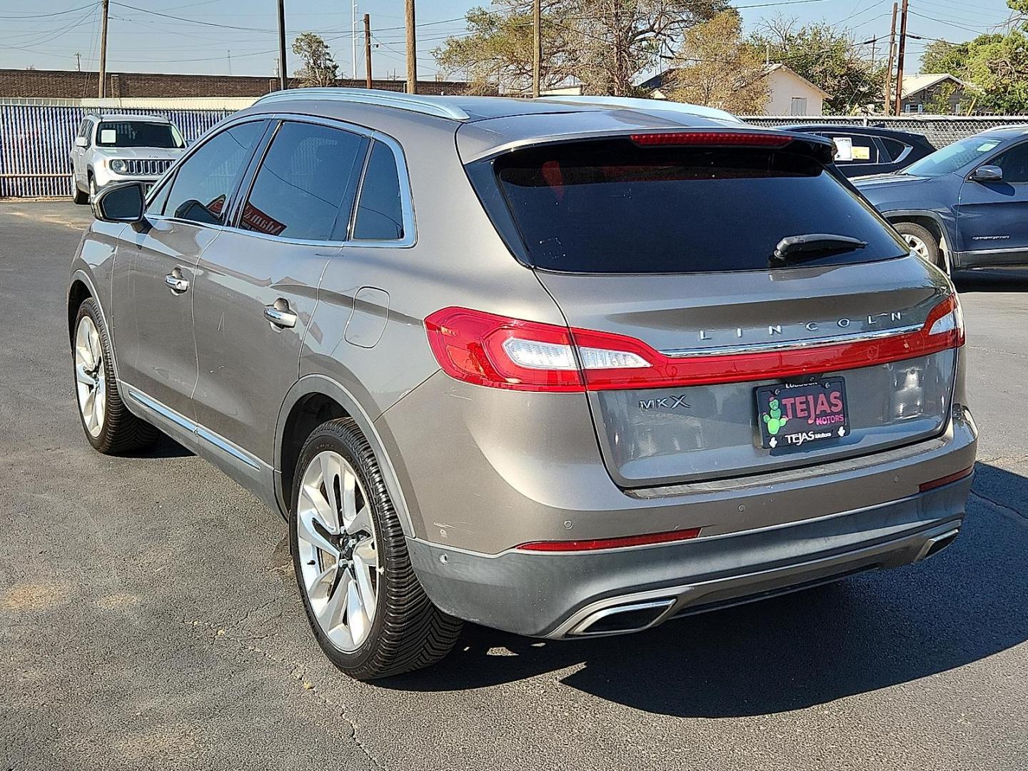 2017 GRAY Lincoln MKX Reserve (2LMPJ6LR6HB) with an 3.7L V-6 DOHC, variable valve control, regular unleaded, engine with 303HP engine, located at 4110 Avenue Q, Lubbock, 79412, 33.556553, -101.855820 - 08/08/2025 KEY IN ENVELOPE GOD - Photo#2