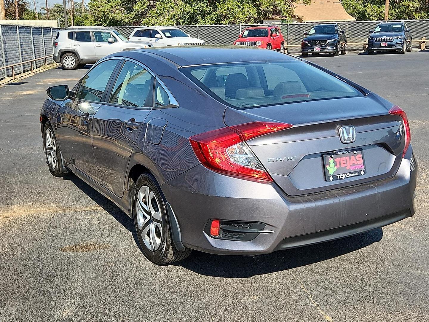 2017 GRAY Honda Civic LX (19XFC2F56HE) with an 2L I-4 DOHC, variable valve control, regular unleaded, engine with 158HP engine, located at 4110 Avenue Q, Lubbock, 79412, 33.556553, -101.855820 - 08/08/2025 KEY IN ENVELOPE GOD - Photo#2