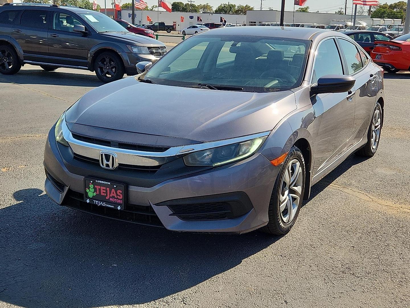 2017 GRAY Honda Civic LX (19XFC2F56HE) with an 2L I-4 DOHC, variable valve control, regular unleaded, engine with 158HP engine, located at 4110 Avenue Q, Lubbock, 79412, 33.556553, -101.855820 - 08/08/2025 KEY IN ENVELOPE GOD - Photo#3