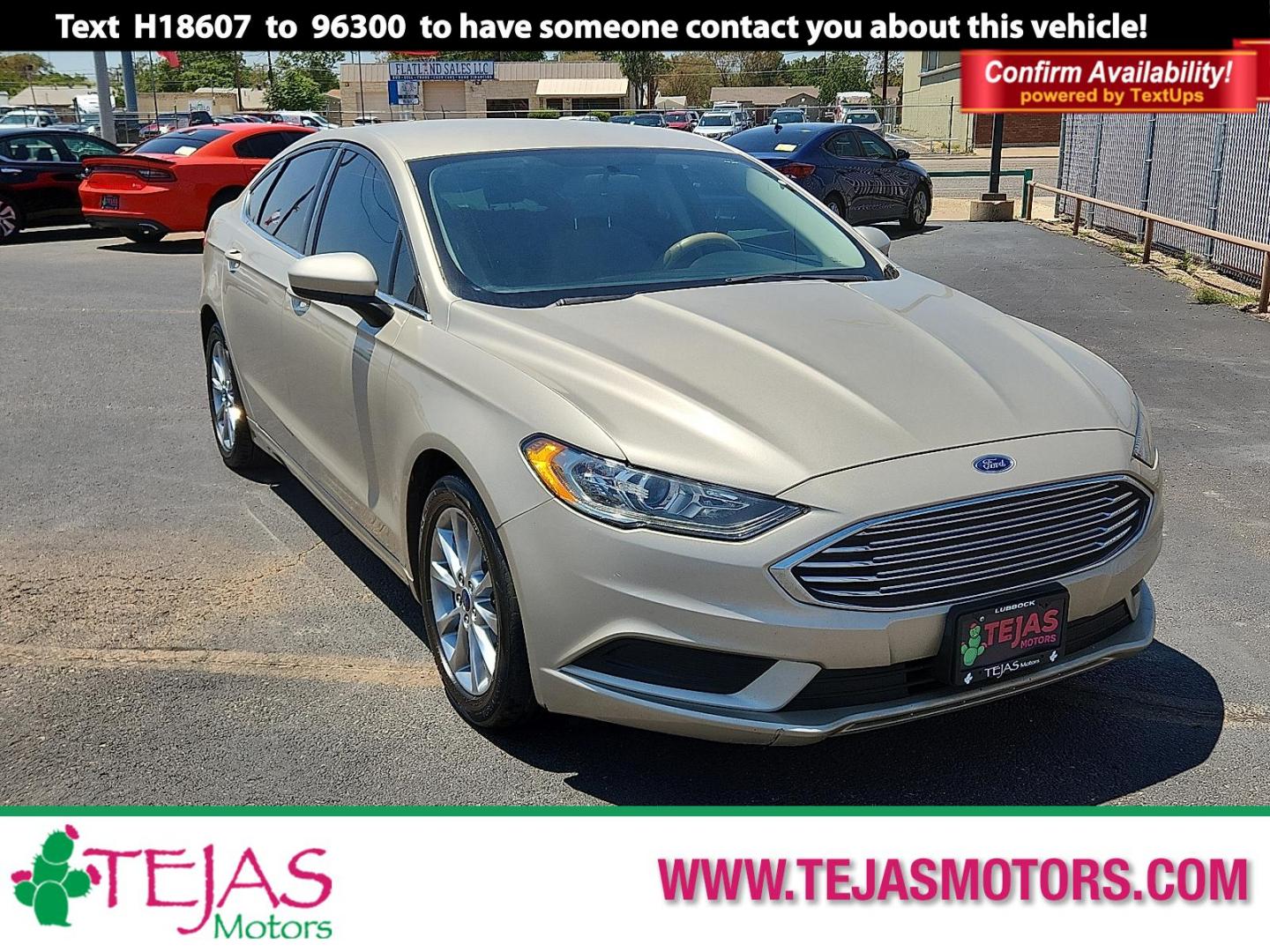 2017 GOLD Ford Fusion SE (3FA6P0H71HR) with an Duratec 2.5L I-4 DOHC, Ti-VCT variable valve control, regular unleaded, engine with 175HP engine, located at 4110 Avenue Q, Lubbock, 79412, 33.556553, -101.855820 - 08/08/2025 KEY IN ENVELOPE GOD - Photo#0