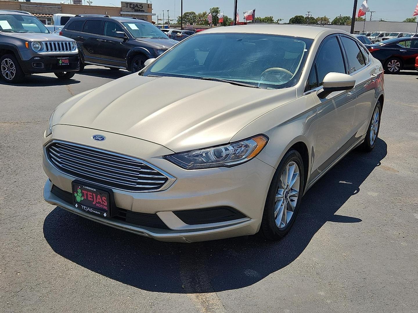 2017 GOLD Ford Fusion SE (3FA6P0H71HR) with an Duratec 2.5L I-4 DOHC, Ti-VCT variable valve control, regular unleaded, engine with 175HP engine, located at 4110 Avenue Q, Lubbock, 79412, 33.556553, -101.855820 - 08/08/2025 KEY IN ENVELOPE GOD - Photo#3