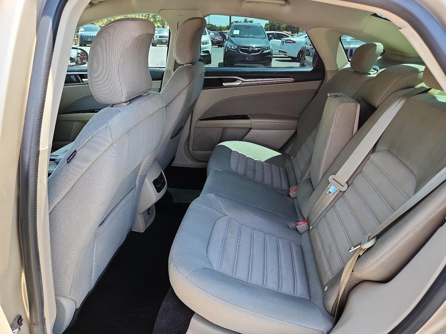 2017 GOLD Ford Fusion SE (3FA6P0H71HR) with an Duratec 2.5L I-4 DOHC, Ti-VCT variable valve control, regular unleaded, engine with 175HP engine, located at 4110 Avenue Q, Lubbock, 79412, 33.556553, -101.855820 - 08/08/2025 KEY IN ENVELOPE GOD - Photo#4