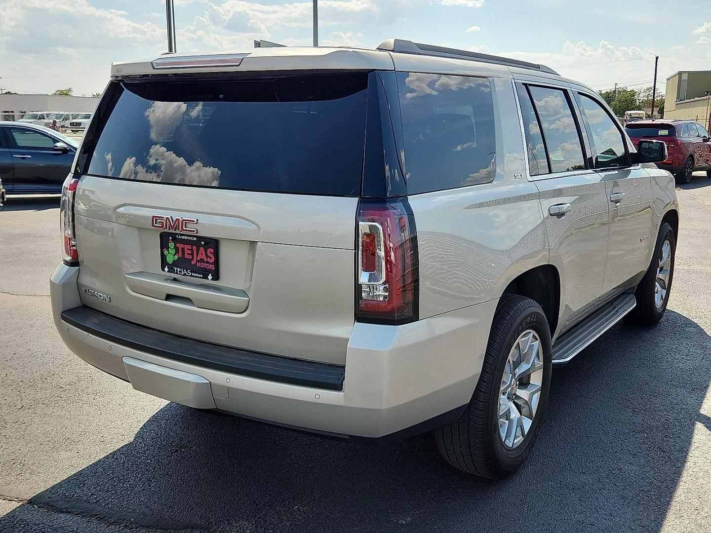 2015 GOLD GMC Yukon SLT (1GKS1BKC8FR) with an EcoTec3 5.3L V-8 gasoline direct injection, variable valve control, regular unleaded, engine with cylinder deactivation and 355HP engine, located at 4110 Avenue Q, Lubbock, 79412, 33.556553, -101.855820 - Photo#3