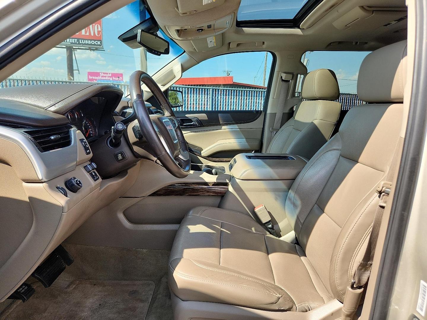 2015 GOLD GMC Yukon SLT (1GKS1BKC8FR) with an EcoTec3 5.3L V-8 gasoline direct injection, variable valve control, regular unleaded, engine with cylinder deactivation and 355HP engine, located at 4110 Avenue Q, Lubbock, 79412, 33.556553, -101.855820 - Photo#6