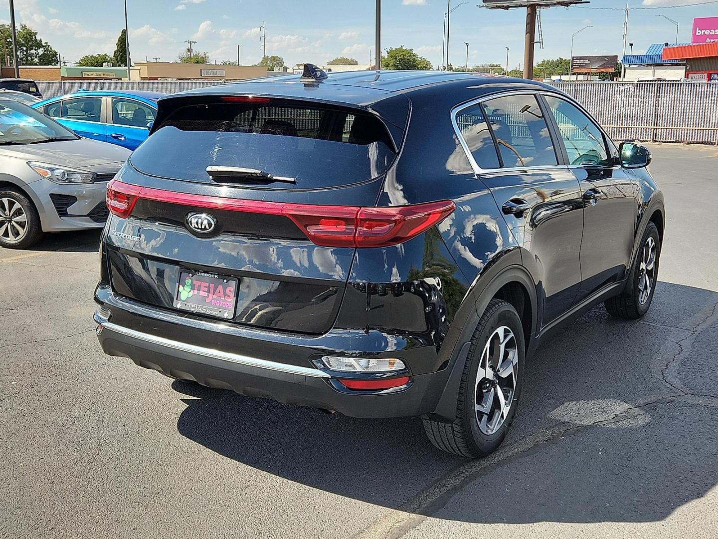 2020 BLACK Kia Sportage LX (KNDPMCAC6L7) with an Theta II 2.4L I-4 gasoline direct injection, DOHC, D-CVVT variable valve control, regular unleaded, engine with 181HP engine, located at 4110 Avenue Q, Lubbock, 79412, 33.556553, -101.855820 - 09/02/2025 KEY IN ENVELOPE GOD - Photo#1