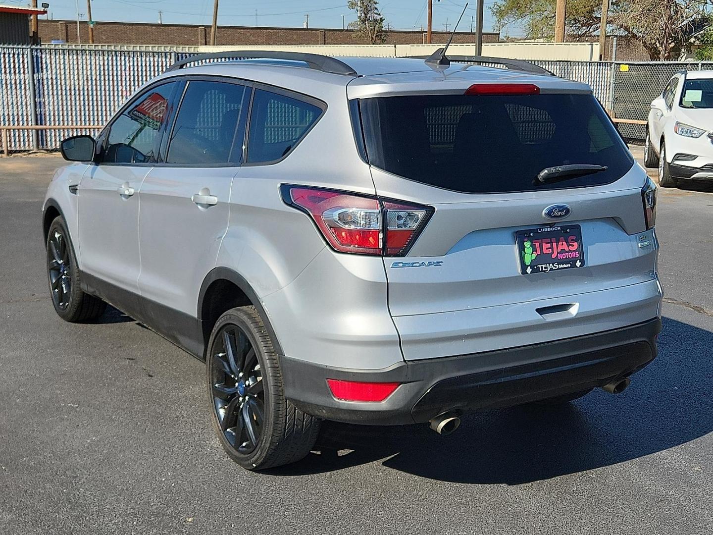 2018 Ingot Silver Metallic - UX /Charcoal Black - KB Ford Escape SE (1FMCU0GD2JU) with an EcoBoost 1.5L I-4 gasoline direct injection, DOHC, variable valve control, intercooled turbo, regular unleaded, engine with 179HP engine, located at 4110 Avenue Q, Lubbock, 79412, 33.556553, -101.855820 - 09/02/2025 KEY IN ENVELOPE GOD - Photo#2