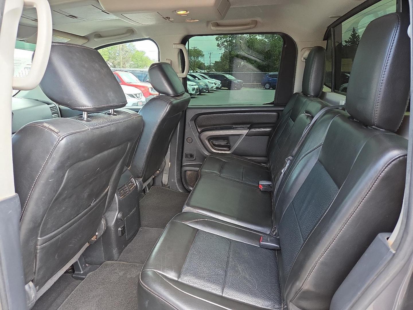 2015 Gun Metallic - KAD /Charcoal - G Nissan Titan SL (1N6BA0EC5FN) with an Endurance 5.6L V-8 DOHC, variable valve control, regular unleaded, engine with 317HP engine, located at 4110 Avenue Q, Lubbock, 79412, 33.556553, -101.855820 - 09/13/2025 KEY IN ENVELOPE GOD - Photo#6