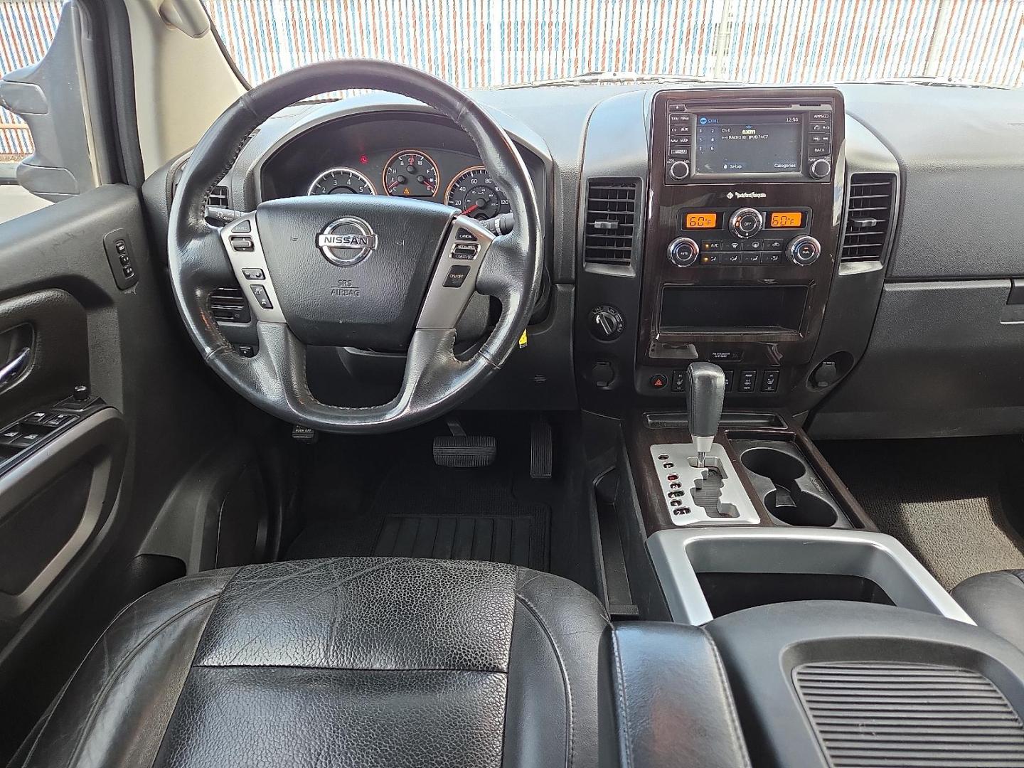 2015 Gun Metallic - KAD /Charcoal - G Nissan Titan SL (1N6BA0EC5FN) with an Endurance 5.6L V-8 DOHC, variable valve control, regular unleaded, engine with 317HP engine, located at 4110 Avenue Q, Lubbock, 79412, 33.556553, -101.855820 - 09/13/2025 KEY IN ENVELOPE GOD - Photo#7