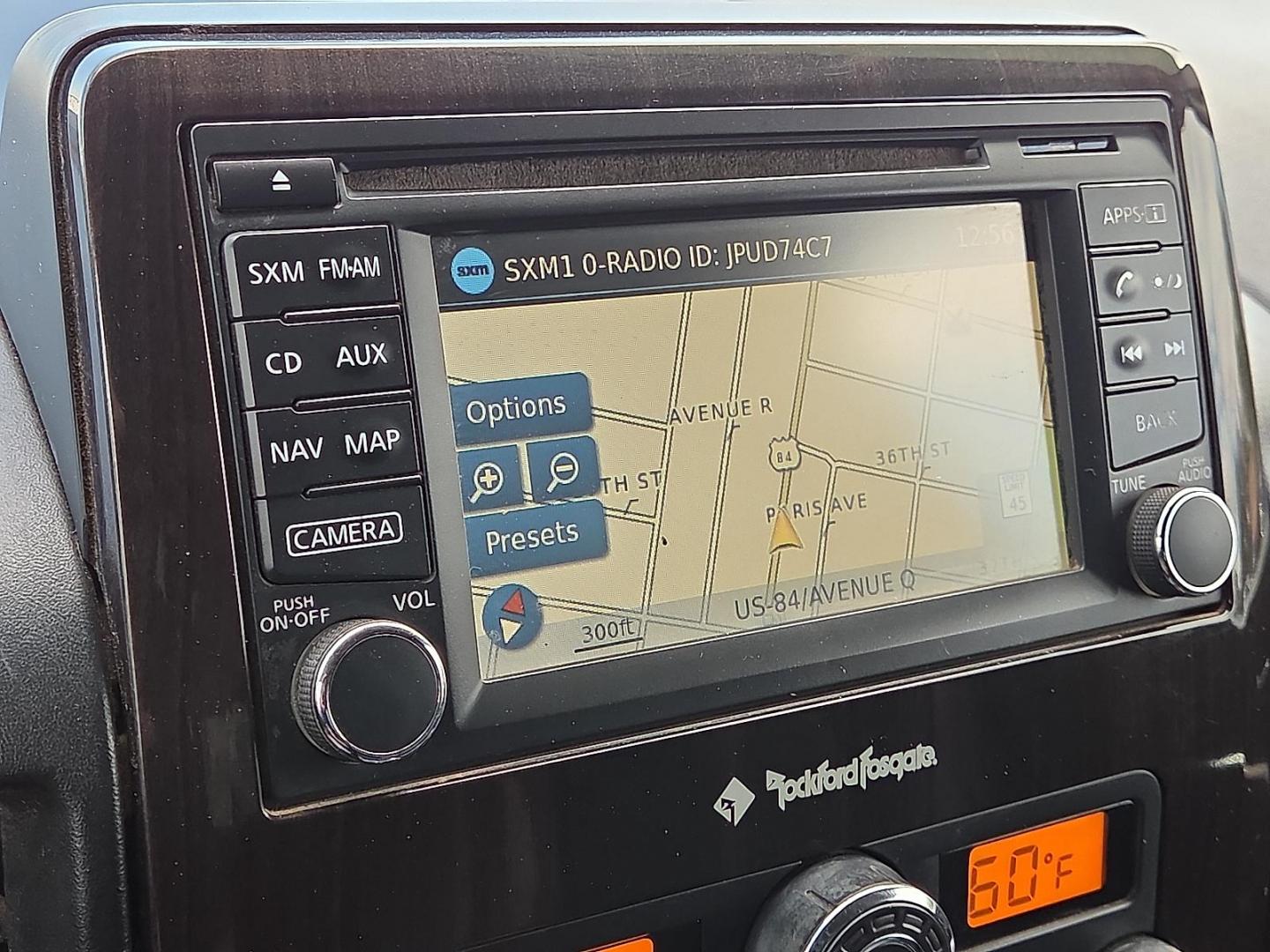 2015 Gun Metallic - KAD /Charcoal - G Nissan Titan SL (1N6BA0EC5FN) with an Endurance 5.6L V-8 DOHC, variable valve control, regular unleaded, engine with 317HP engine, located at 4110 Avenue Q, Lubbock, 79412, 33.556553, -101.855820 - 09/13/2025 KEY IN ENVELOPE GOD - Photo#9