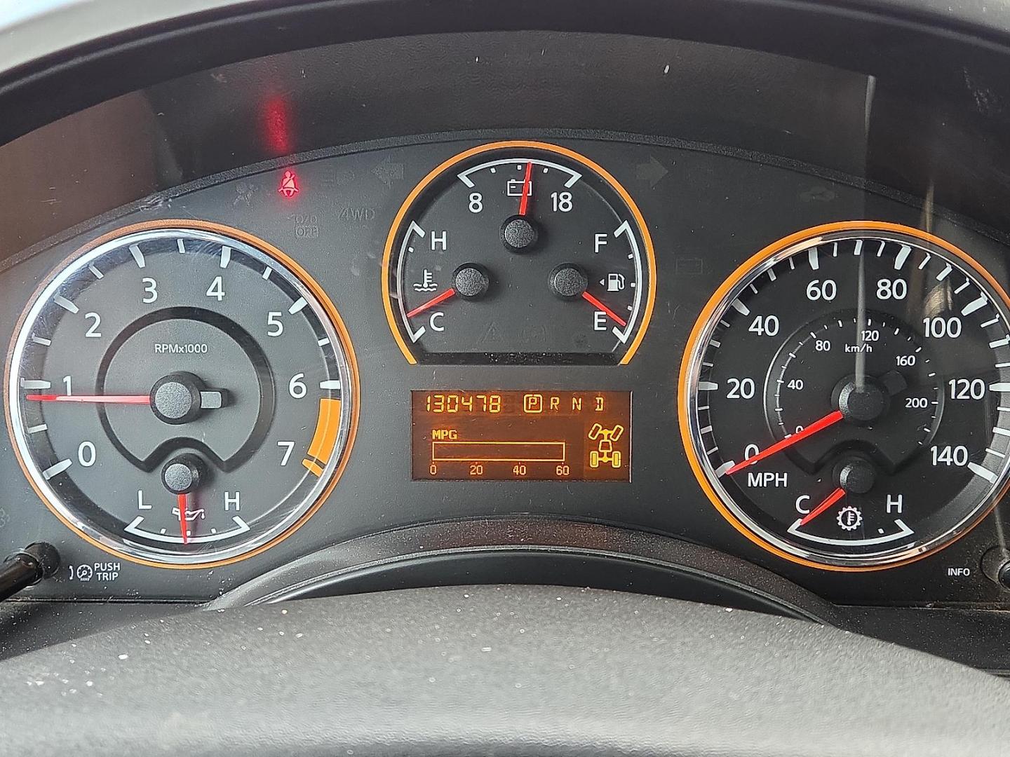 2015 Gun Metallic - KAD /Charcoal - G Nissan Titan SL (1N6BA0EC5FN) with an Endurance 5.6L V-8 DOHC, variable valve control, regular unleaded, engine with 317HP engine, located at 4110 Avenue Q, Lubbock, 79412, 33.556553, -101.855820 - 09/13/2025 KEY IN ENVELOPE GOD - Photo#10