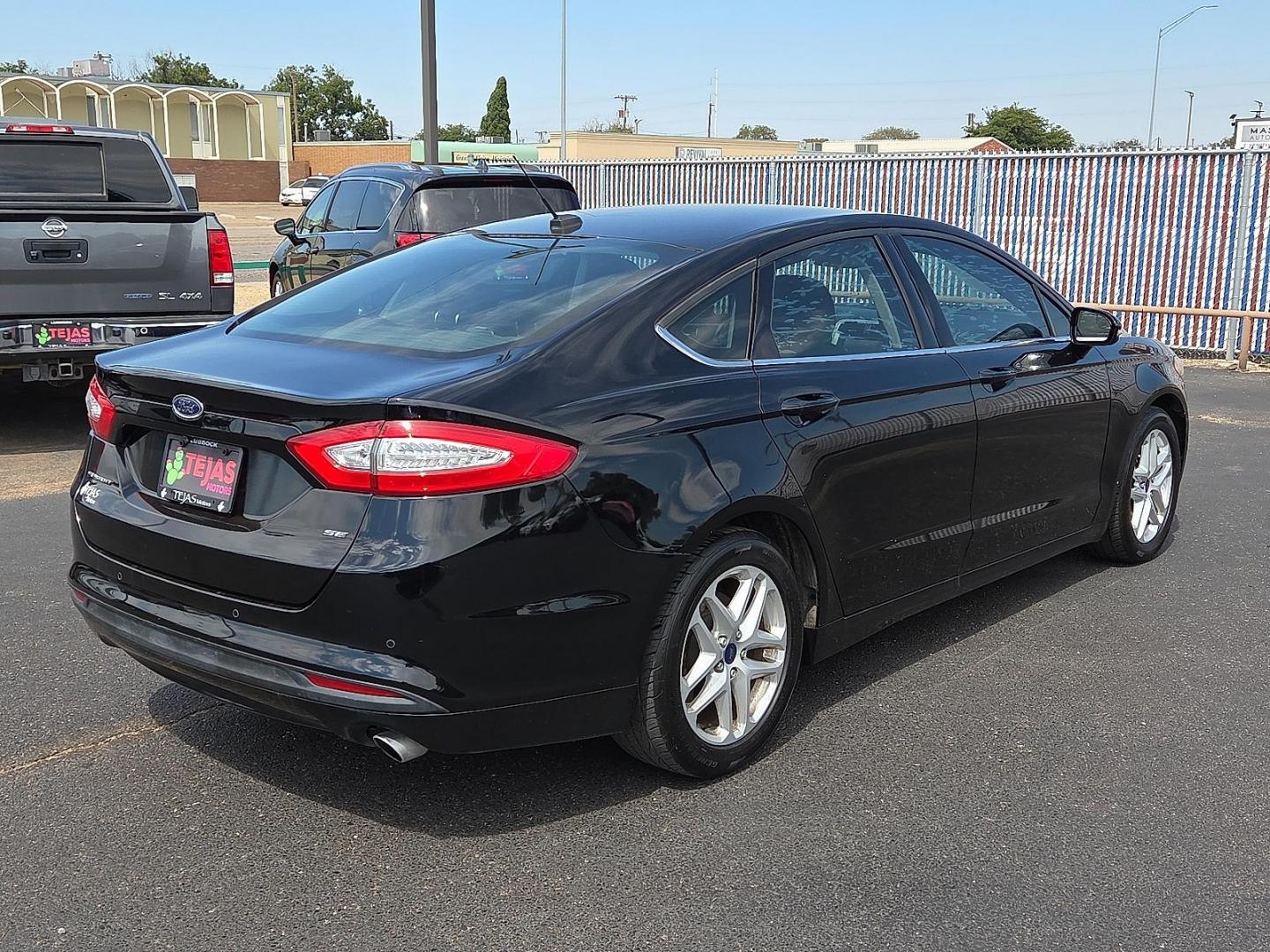 2016 Shadow Black - G1 /Ebony - AW Ford Fusion SE (3FA6P0H74GR) with an Duratec 2.5L I-4 DOHC, iVCT variable valve control, regular unleaded, engine with 175HP engine, located at 4110 Avenue Q, Lubbock, 79412, 33.556553, -101.855820 - 09/13/2025 KEY IN ENVELOPE GOD - Photo#2