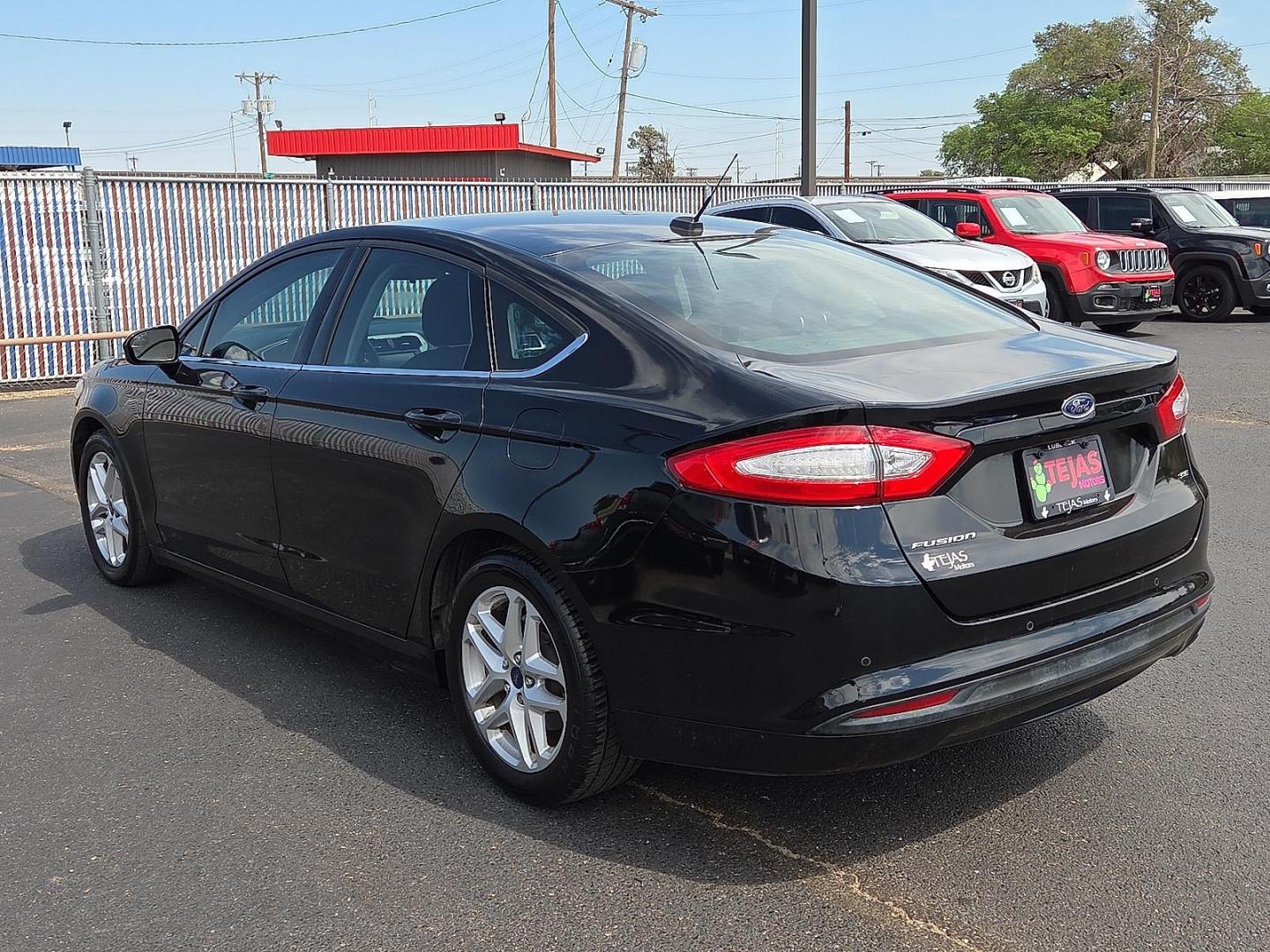 2016 Shadow Black - G1 /Ebony - AW Ford Fusion SE (3FA6P0H74GR) with an Duratec 2.5L I-4 DOHC, iVCT variable valve control, regular unleaded, engine with 175HP engine, located at 4110 Avenue Q, Lubbock, 79412, 33.556553, -101.855820 - 09/13/2025 KEY IN ENVELOPE GOD - Photo#3