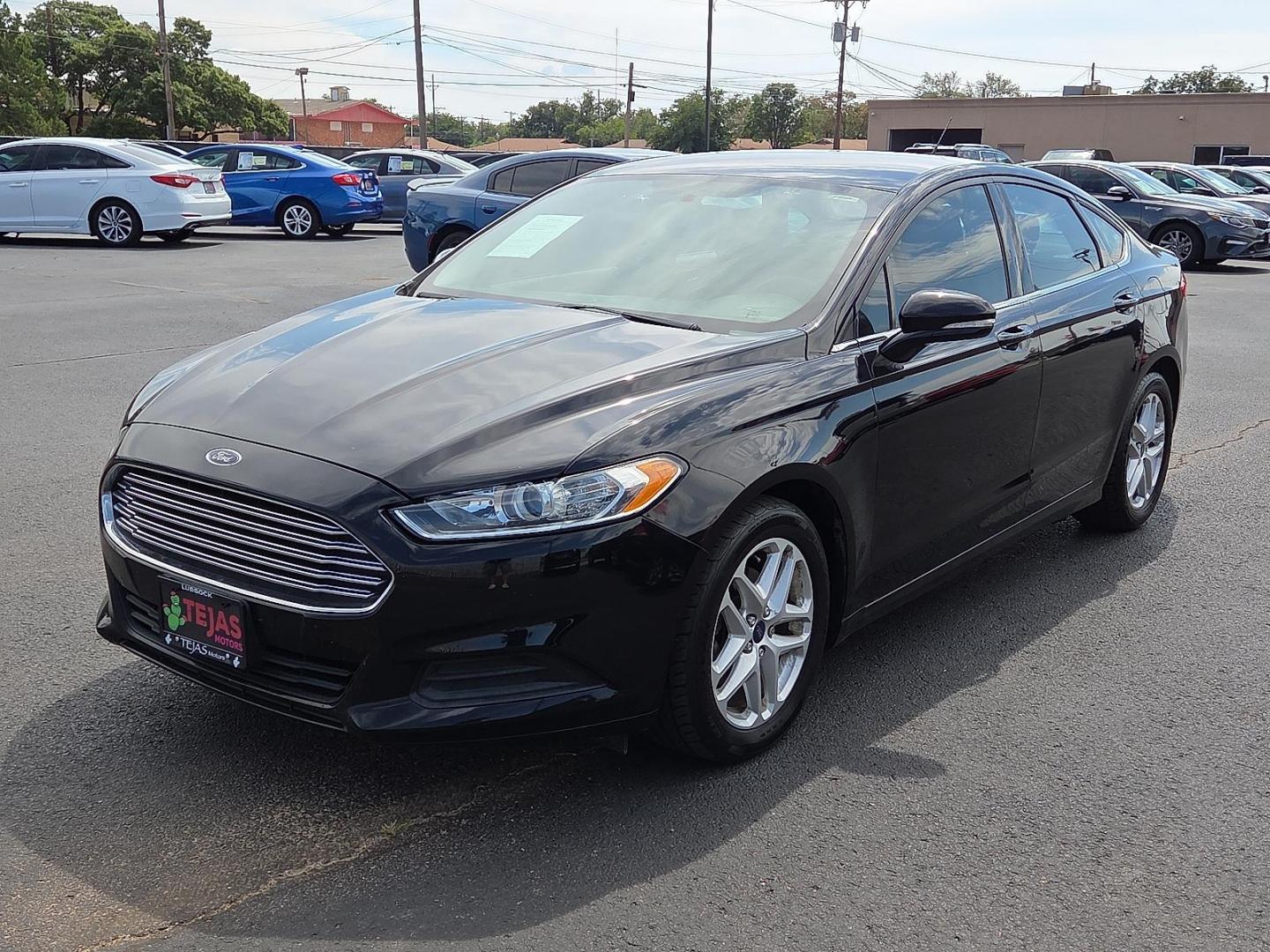 2016 Shadow Black - G1 /Ebony - AW Ford Fusion SE (3FA6P0H74GR) with an Duratec 2.5L I-4 DOHC, iVCT variable valve control, regular unleaded, engine with 175HP engine, located at 4110 Avenue Q, Lubbock, 79412, 33.556553, -101.855820 - 09/13/2025 KEY IN ENVELOPE GOD - Photo#4