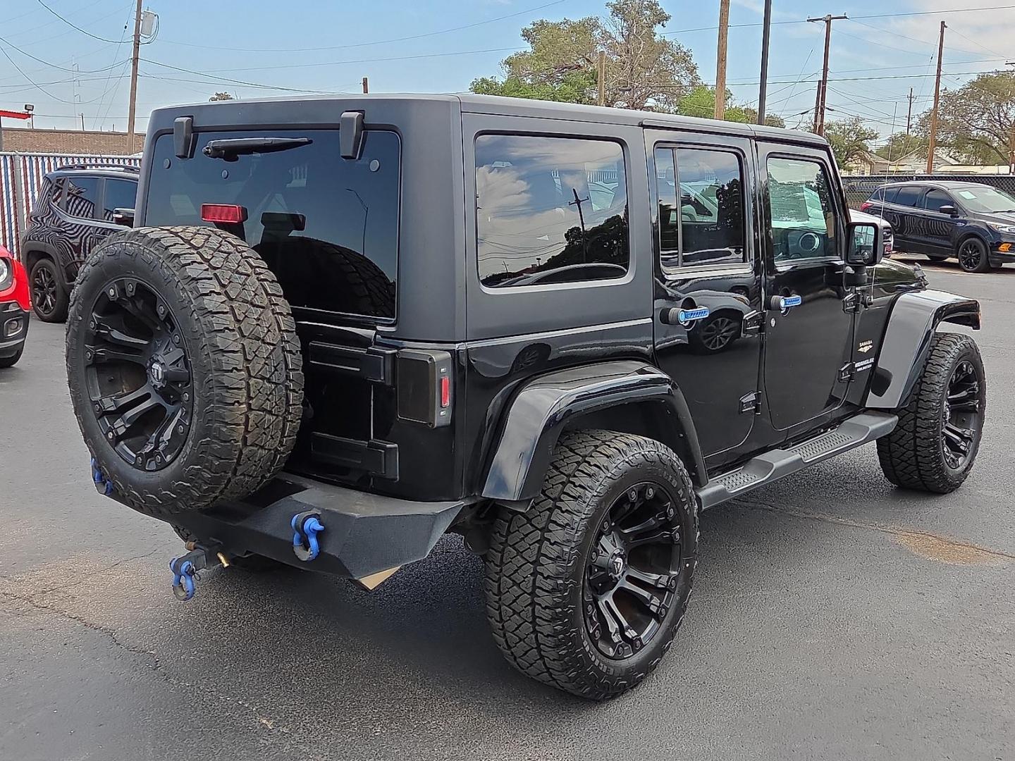 2015 Black Clearcoat - PX8 /Black - X9 Jeep Wrangler Unlimited Sahara (1C4BJWEG1FL) with an 3.6L V-6 DOHC, variable valve control, regular unleaded, engine with 285HP engine, located at 4110 Avenue Q, Lubbock, 79412, 33.556553, -101.855820 - 09/19/2025 KEY IN ENVELOPE GOD - Photo#2