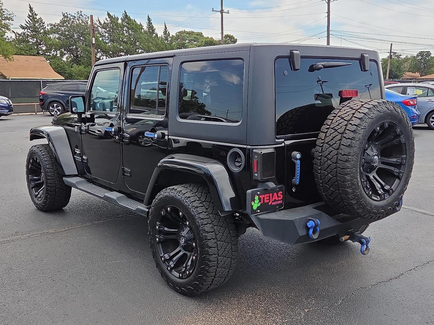 2015 Black Clearcoat - PX8 /Black - X9 Jeep Wrangler Unlimited Sahara (1C4BJWEG1FL) with an 3.6L V-6 DOHC, variable valve control, regular unleaded, engine with 285HP engine, located at 4110 Avenue Q, Lubbock, 79412, 33.556553, -101.855820 - 09/19/2025 KEY IN ENVELOPE GOD - Photo#3