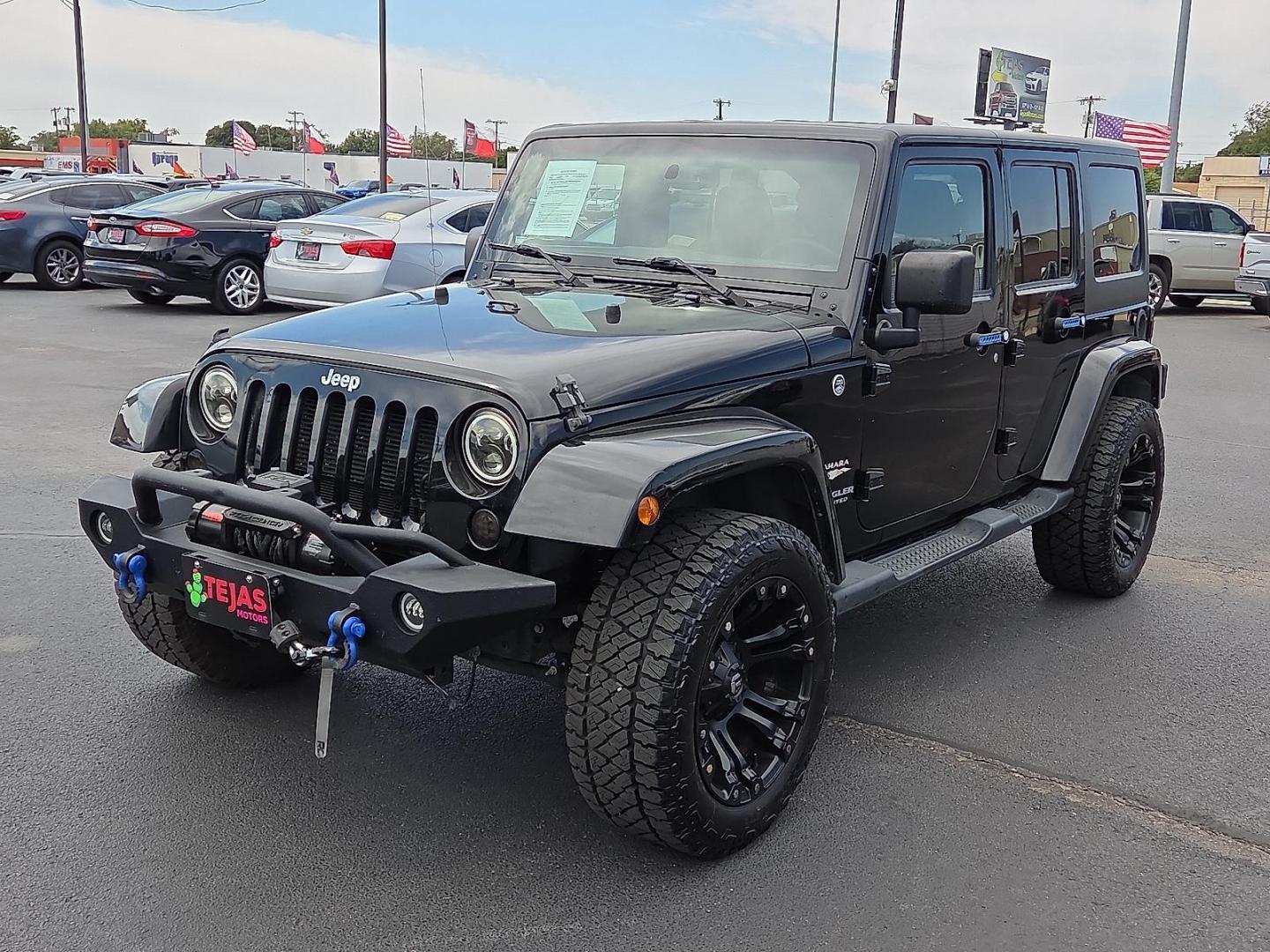 2015 Black Clearcoat - PX8 /Black - X9 Jeep Wrangler Unlimited Sahara (1C4BJWEG1FL) with an 3.6L V-6 DOHC, variable valve control, regular unleaded, engine with 285HP engine, located at 4110 Avenue Q, Lubbock, 79412, 33.556553, -101.855820 - 09/19/2025 KEY IN ENVELOPE GOD - Photo#4