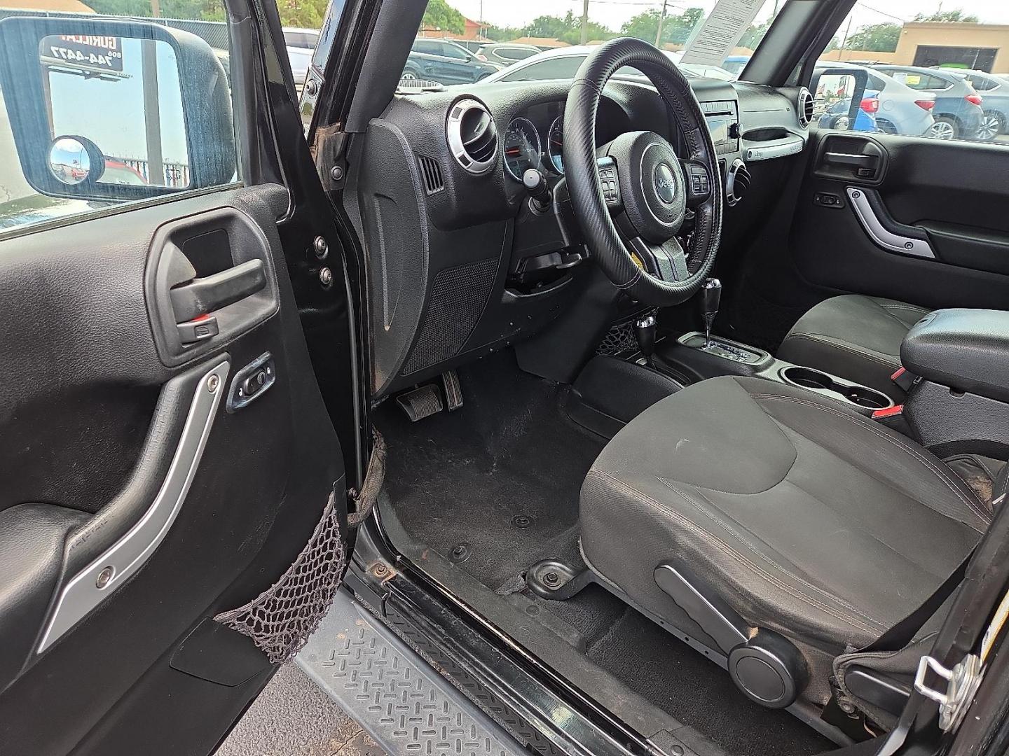 2015 Black Clearcoat - PX8 /Black - X9 Jeep Wrangler Unlimited Sahara (1C4BJWEG1FL) with an 3.6L V-6 DOHC, variable valve control, regular unleaded, engine with 285HP engine, located at 4110 Avenue Q, Lubbock, 79412, 33.556553, -101.855820 - 09/19/2025 KEY IN ENVELOPE GOD - Photo#7