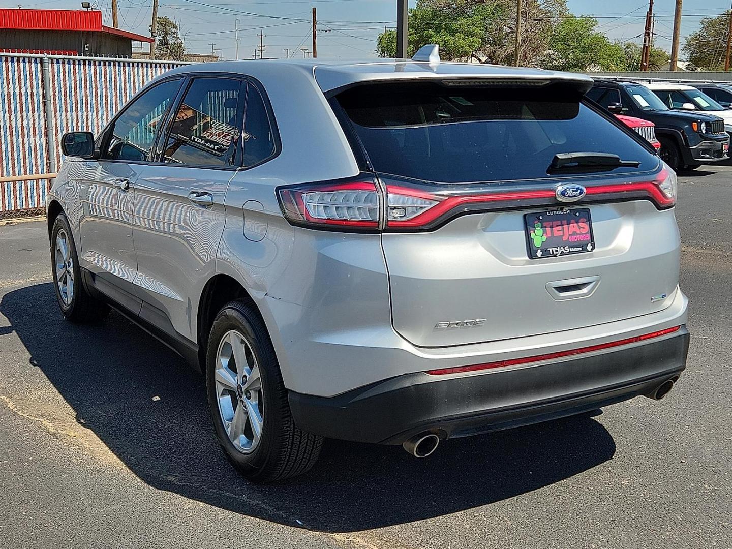 2017 SILVER Ford Edge SE (2FMPK4G97HB) with an EcoBoost 2L I-4 gasoline direct injection, DOHC, variable valve control, intercooled turbo, premium unleaded, engine with 245HP engine, located at 4110 Avenue Q, Lubbock, 79412, 33.556553, -101.855820 - Photo#2