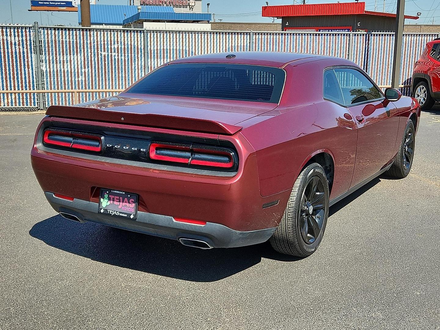2018 Octane Red Pearlcoat - PRV Dodge Challenger SXT (2C3CDZAG6JH) with an Pentastar 3.6L V-6 DOHC, variable valve control, regular unleaded, engine with 305HP engine, located at 4110 Avenue Q, Lubbock, 79412, 33.556553, -101.855820 - 09/26/2025 KEY IN ENVELOPE GOD - Photo#1