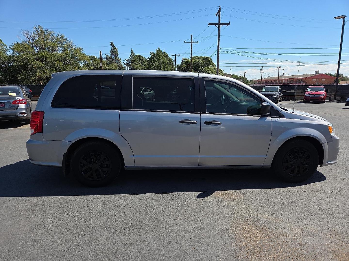 2019 Billet Clearcoat - PSC /Black - X9 Dodge Grand Caravan SE (2C4RDGBG5KR) with an Pentastar 3.6L V-6 DOHC, VVT variable valve control, regular unleaded, engine with 283HP engine, located at 4110 Avenue Q, Lubbock, 79412, 33.556553, -101.855820 - Photo#1