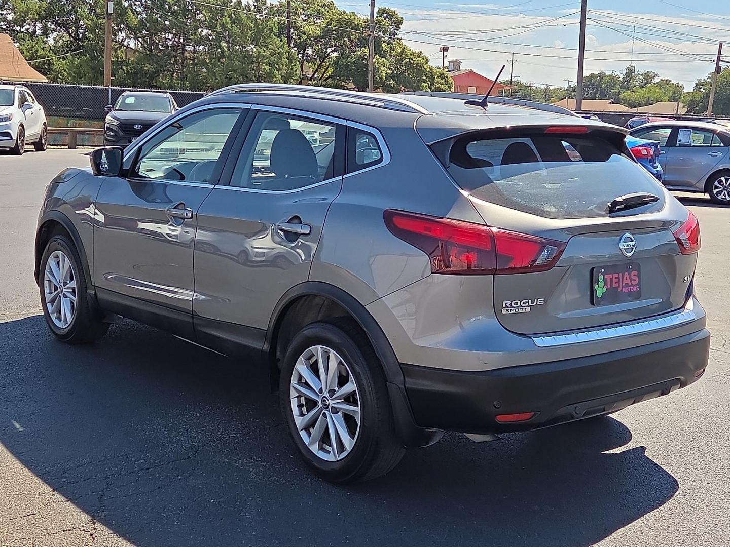 2019 Gun Metallic - KAD /Charcoal - G Nissan Rogue Sport SV (JN1BJ1CP1KW) with an 2L I-4 gasoline direct injection, DOHC, variable valve control, regular unleaded, engine with 141HP engine, located at 4110 Avenue Q, Lubbock, 79412, 33.556553, -101.855820 - 09/27/2025 KEY IN ENVELOPE GOD - Photo#3