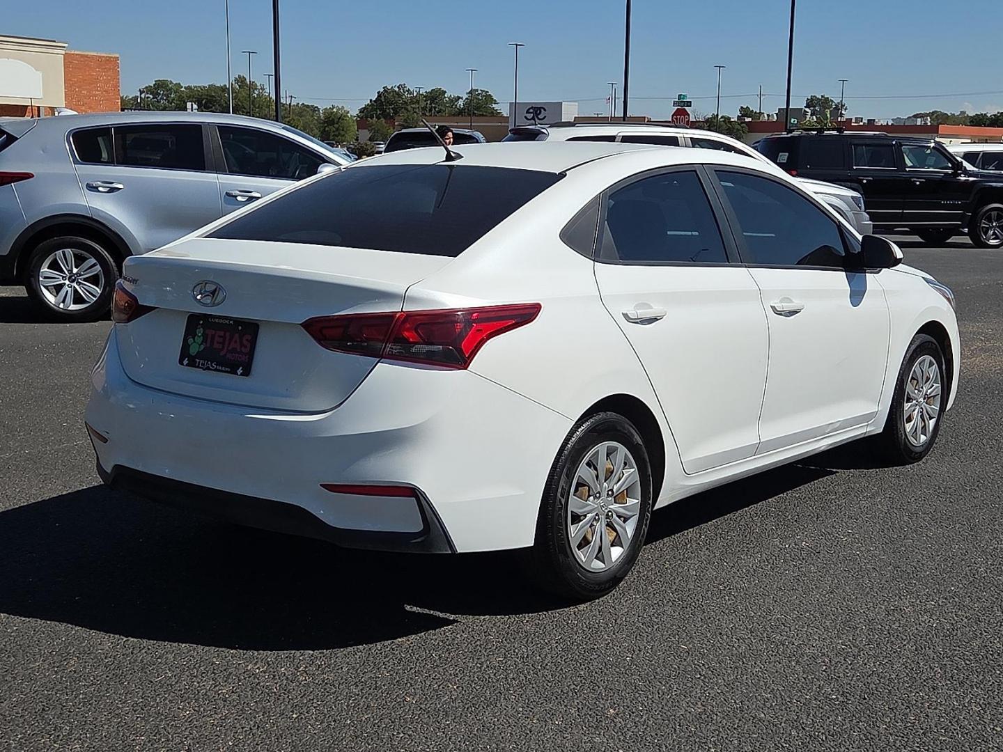 2021 Frost White Pearl - SWP /Black - TRY Hyundai Accent SE (3KPC24A66ME) with an Smartstream 1.6L I-4 port/direct injection, DOHC, CVVT variable valve control, regular unleaded, engine with 120HP engine, located at 4110 Avenue Q, Lubbock, 79412, 33.556553, -101.855820 - Photo#2