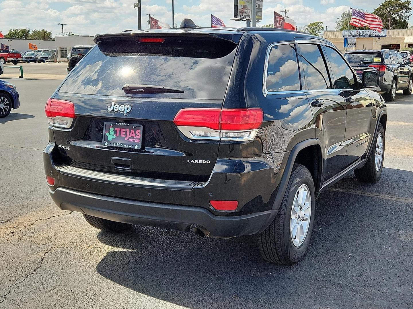 2018 BLACK Jeep Grand Cherokee Laredo 4x4 (1C4RJFAG2JC) with an Pentastar 3.6L V-6 DOHC, variable valve control, regular unleaded, engine with 293HP engine, located at 4110 Avenue Q, Lubbock, 79412, 33.556553, -101.855820 - 10/07/2025 KEY IN ENVELOPE GOD - Photo#1