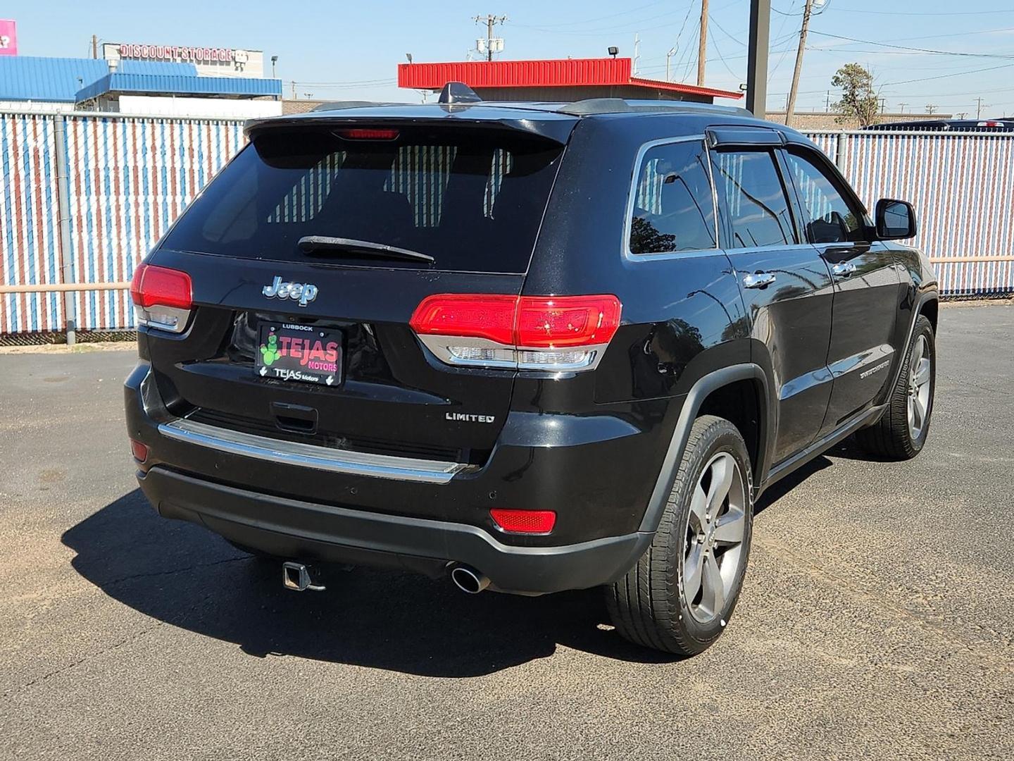 2015 BLACK Jeep Grand Cherokee Limited (1C4RJEBG0FC) with an 3.6L V-6 DOHC, variable valve control, regular unleaded, engine with 290HP engine, located at 4110 Avenue Q, Lubbock, 79412, 33.556553, -101.855820 - Photo#1